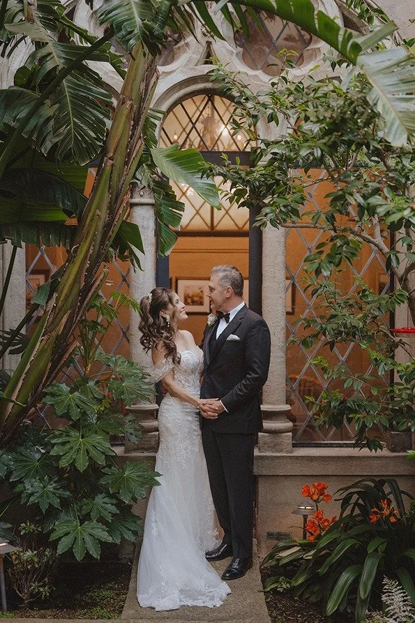 the bride and groom at their historic wedding venue in california