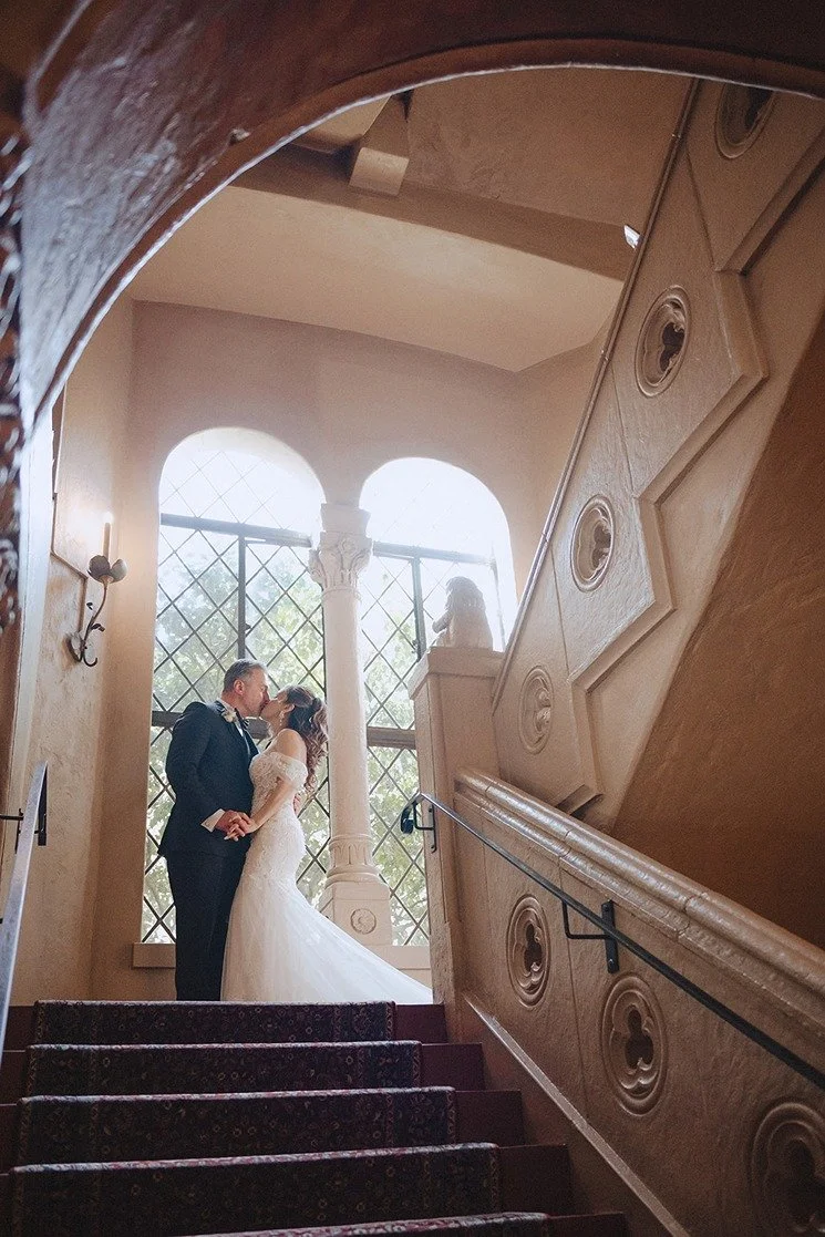the bride and groom at their historic wedding venue in california