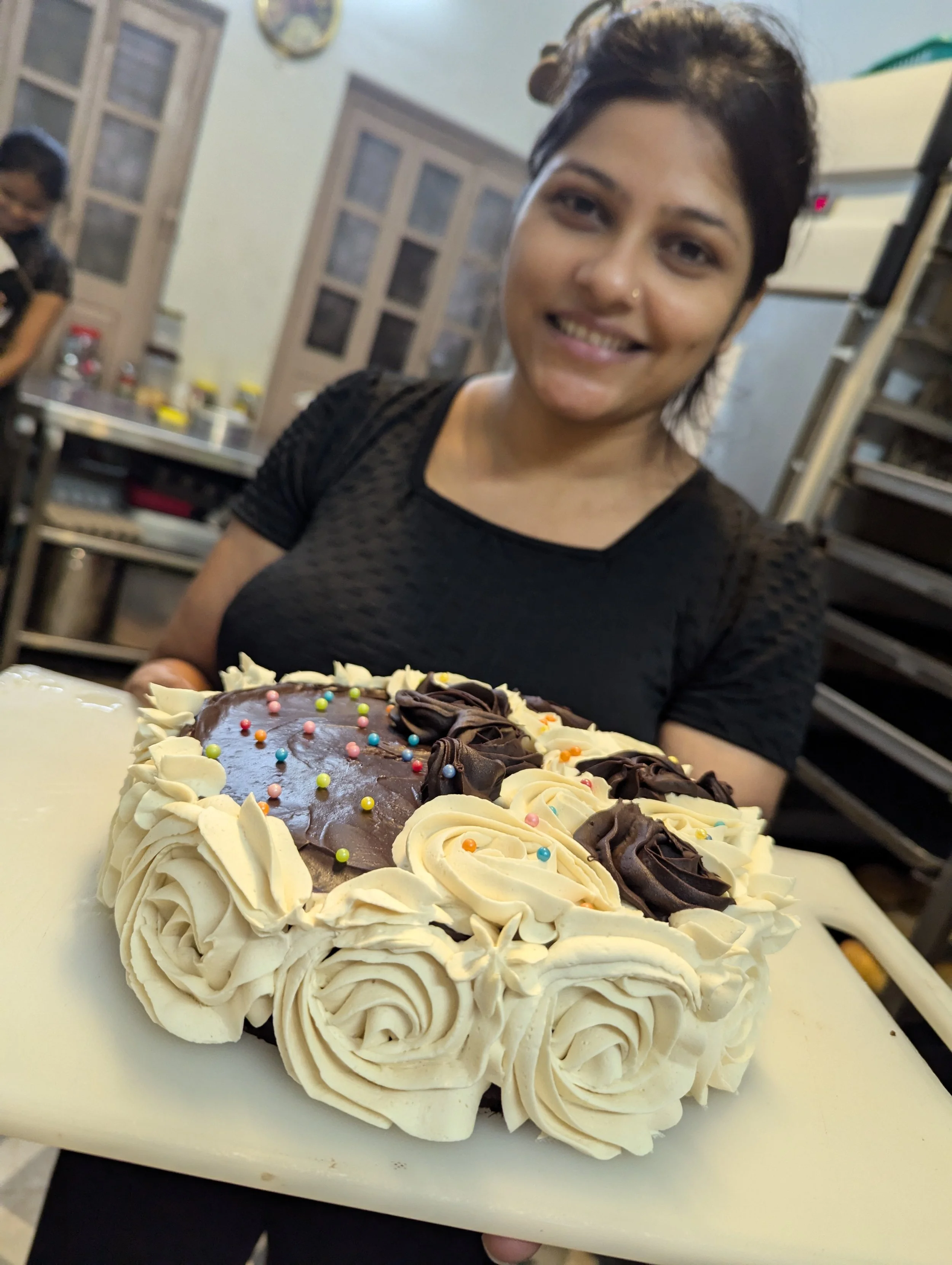 Ruma with Cake 2025 Aug .jpg