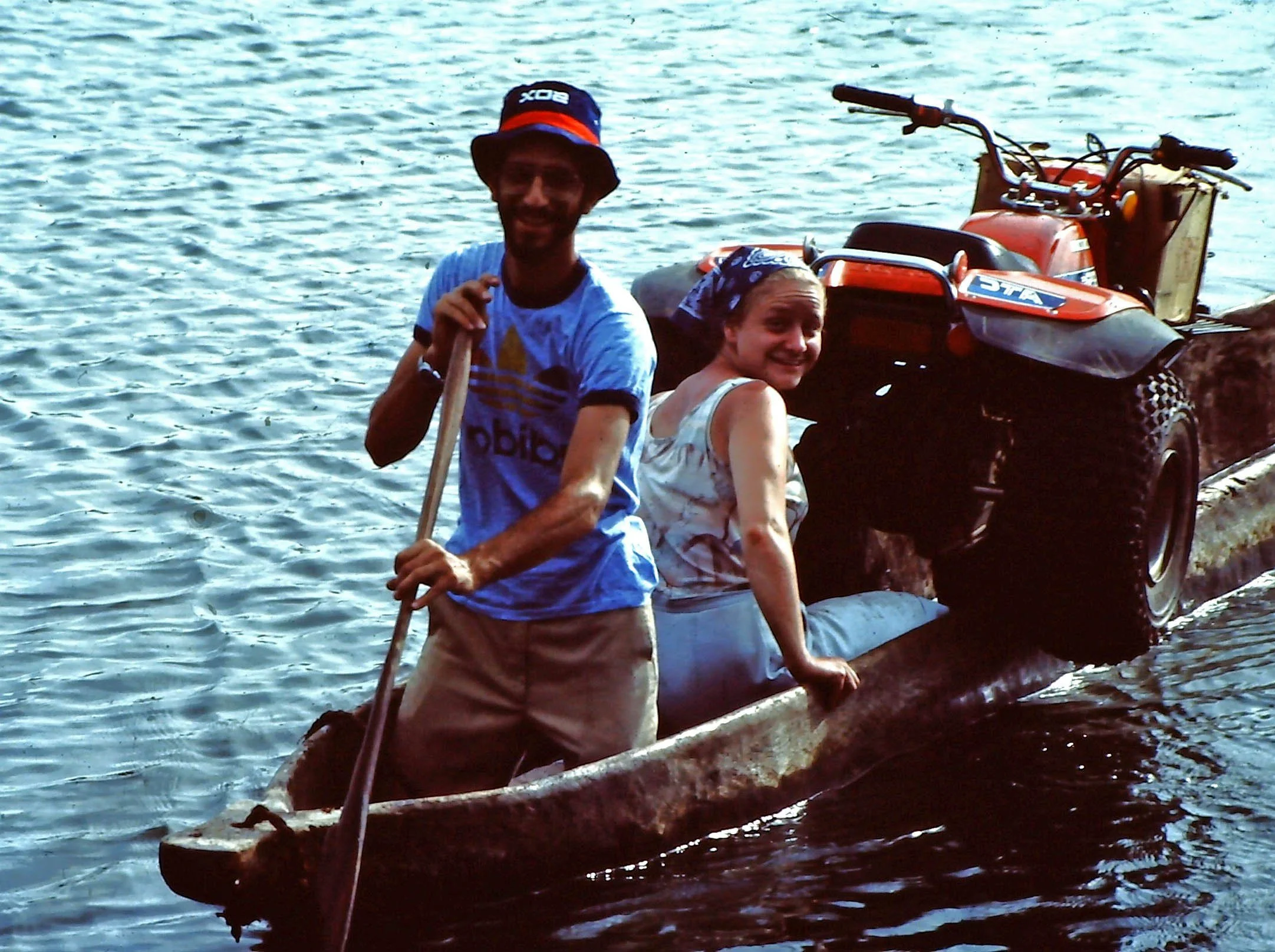 Dr Barbara Oolman crossing Zambezi River in dugout