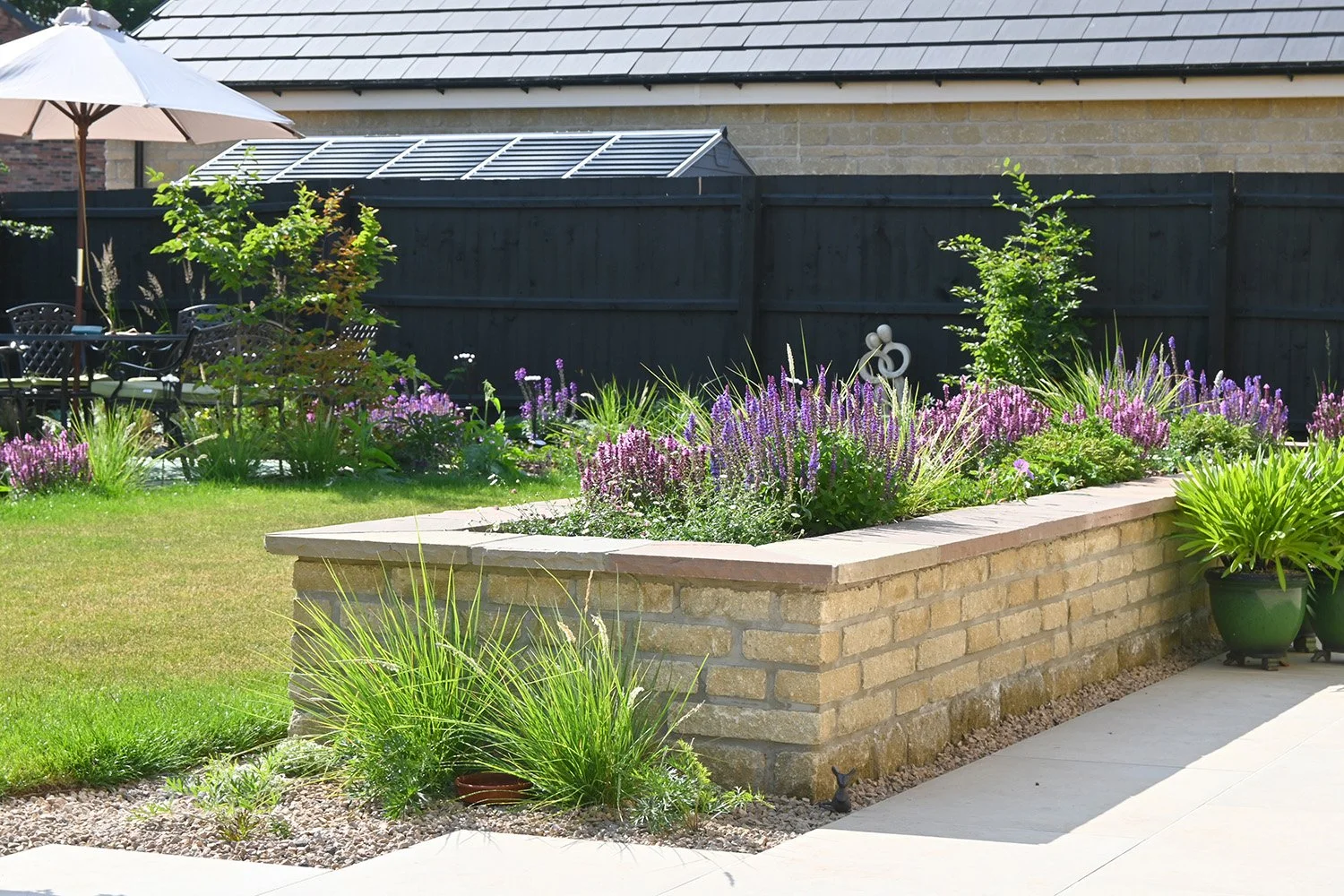 robert-johnson-garden-design-Langtoft-low-planters-soft-planting.jpg
