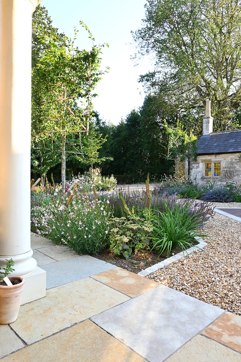 robert-johnson-garden-design-Grantham-limestone-patio-soft-planting.jpg