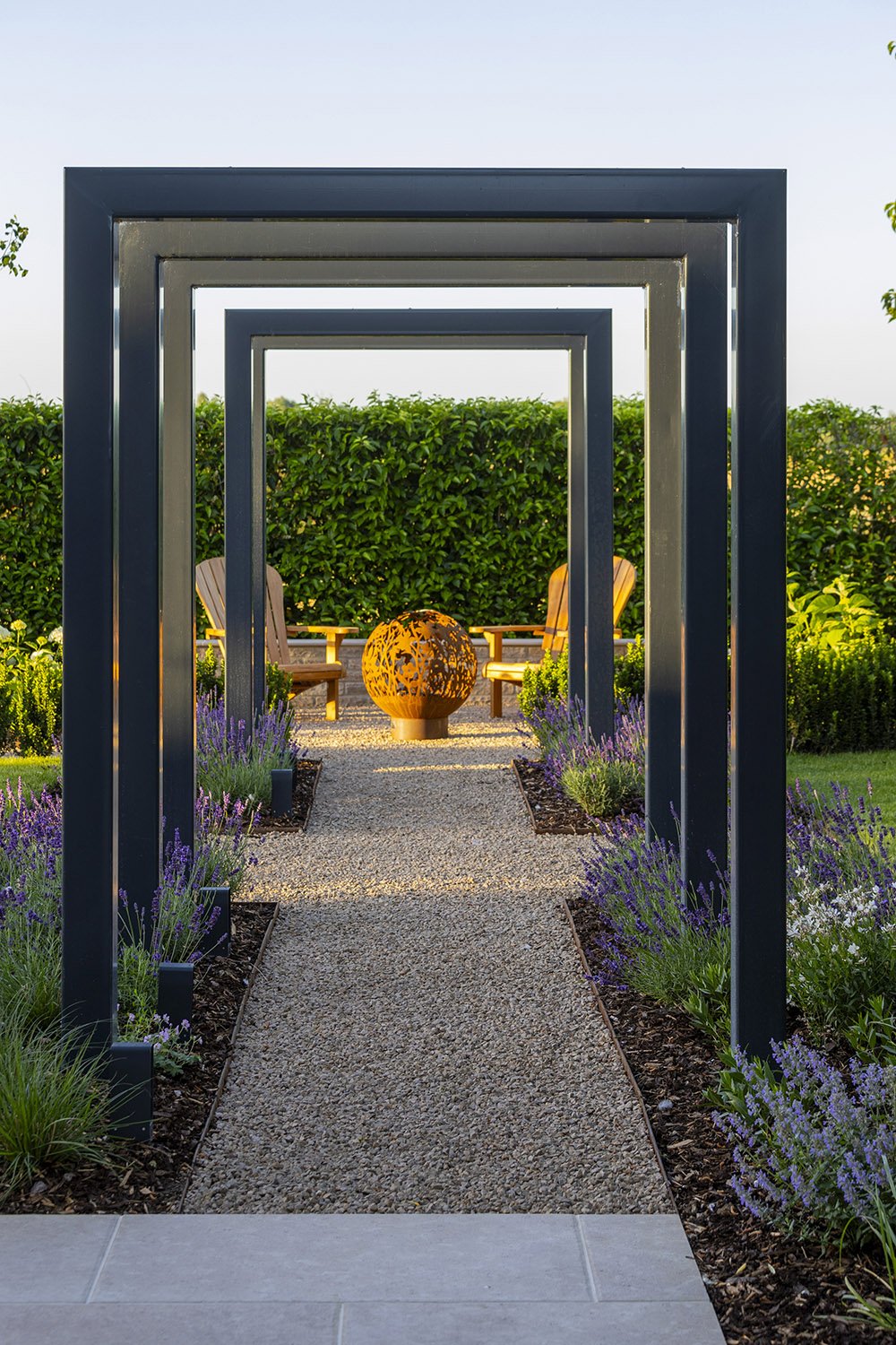 robert-johnson-garden-design-Lincs-metal-arches-corten-firepit-lavender.jpg