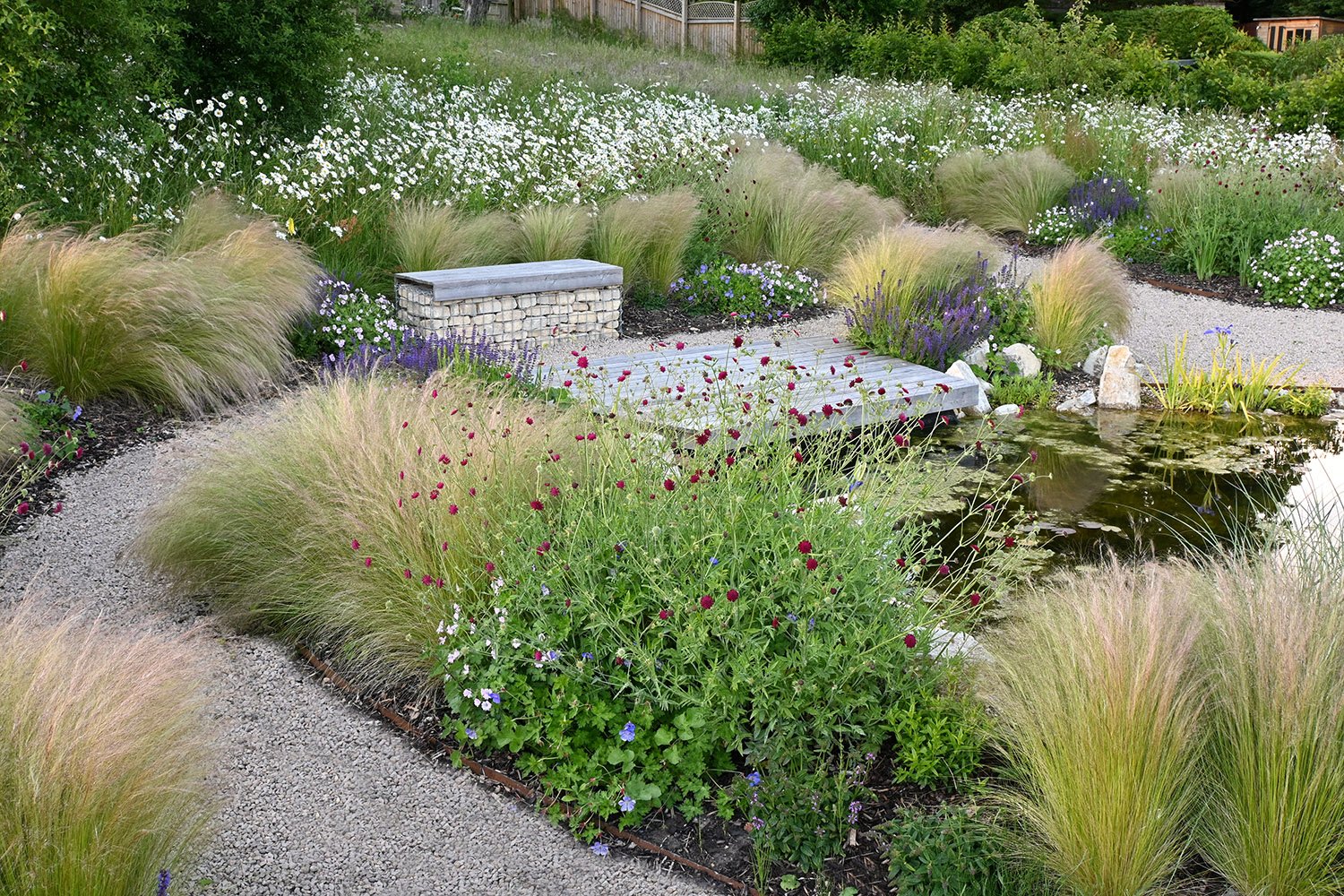 robert-johnson-garden-design-Cambridgeshire-timber-pond-decking-gabion-basket-seating.jpg