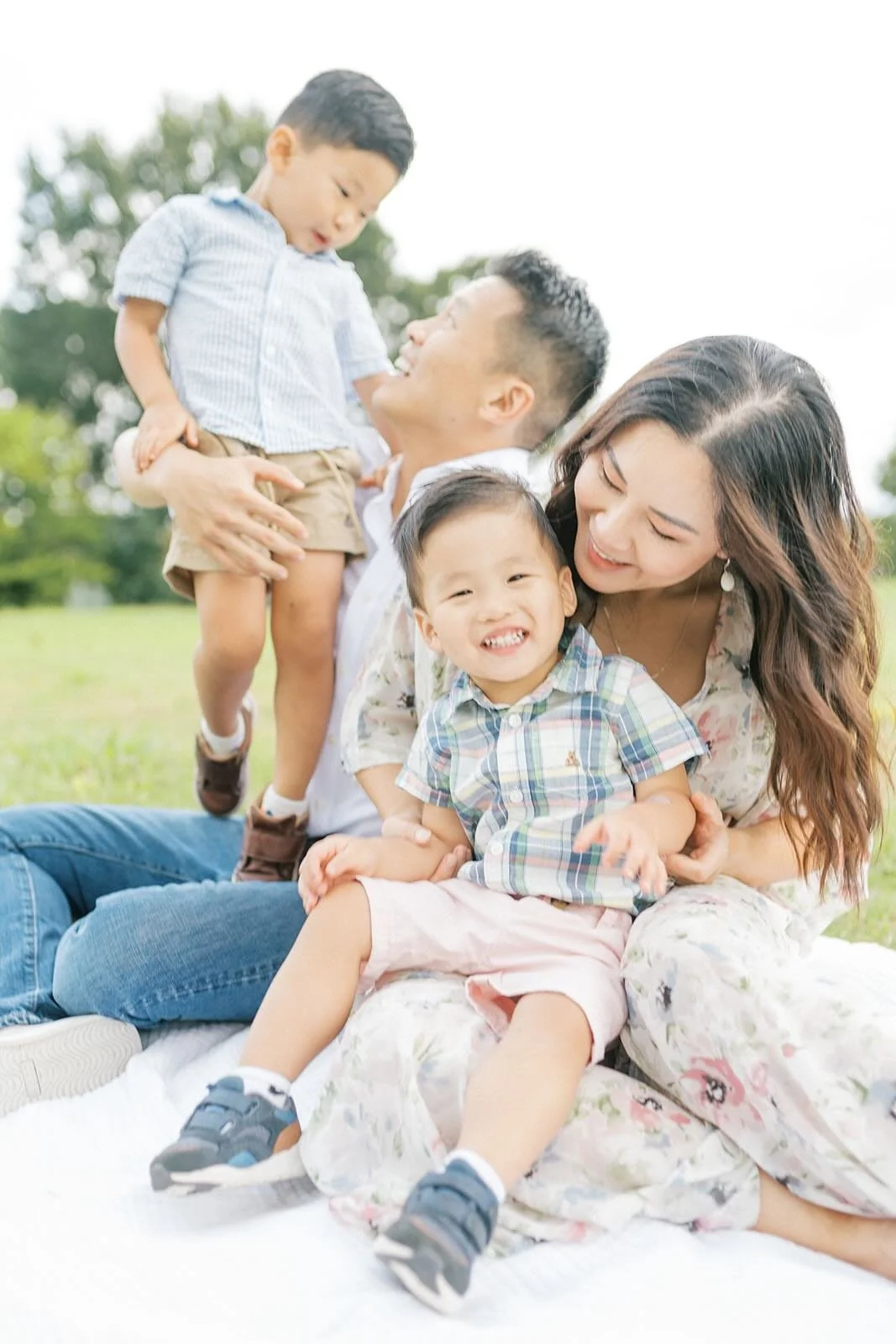 Family outside on a blanket - Raleigh Newborn Photographer