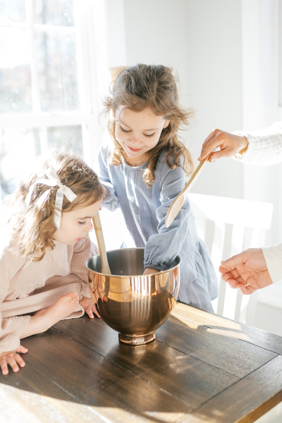 Photography tips for beginners using natural window light to photograph everyday family moments at home