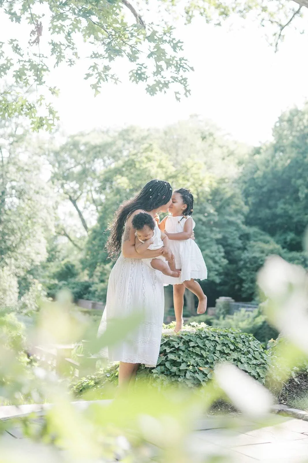 Mom with children outside in the natural light - Raleigh Newborn Photographer