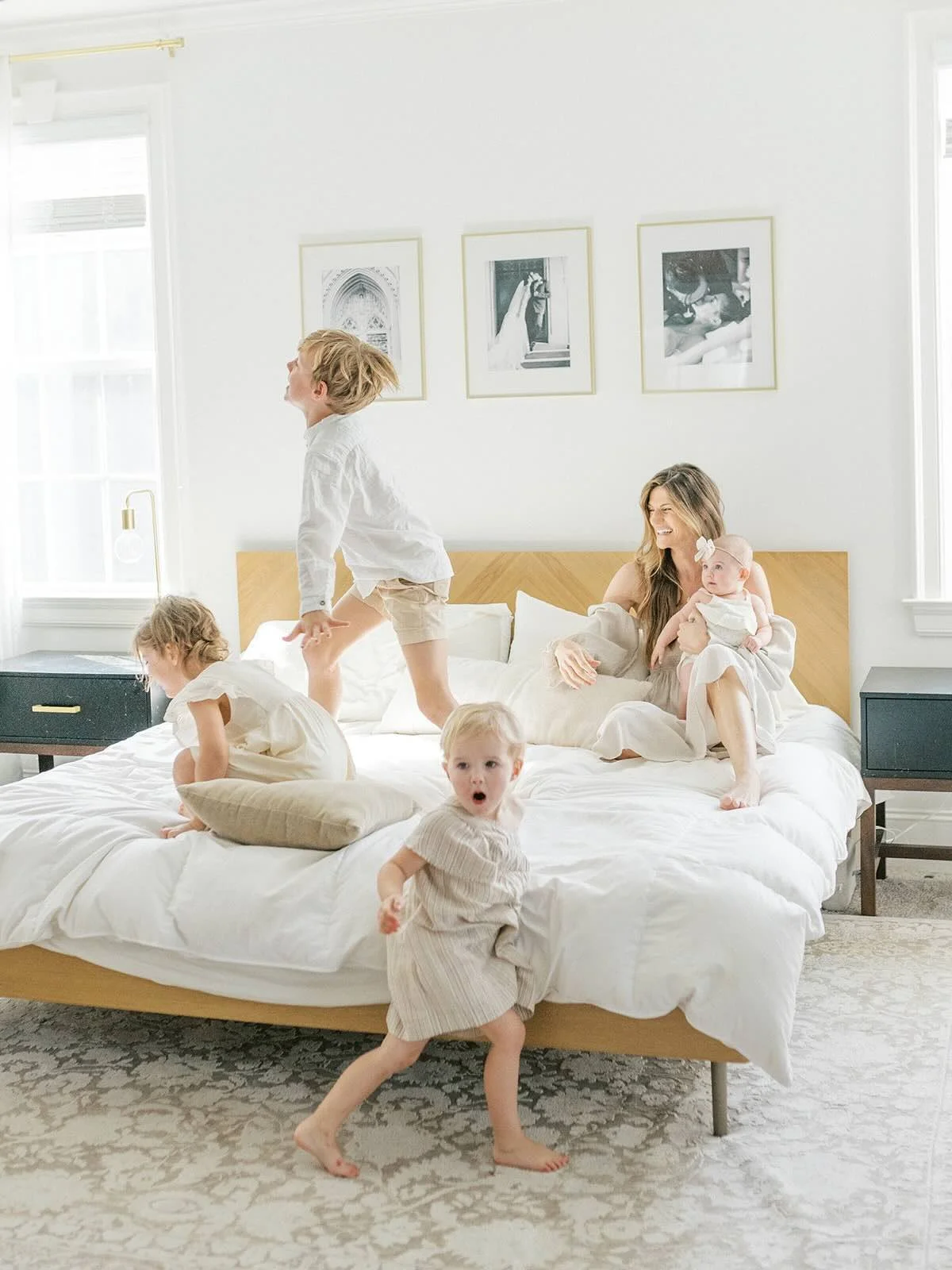 Fun on Mom and Dad's bed - Raleigh Newborn Photographer
