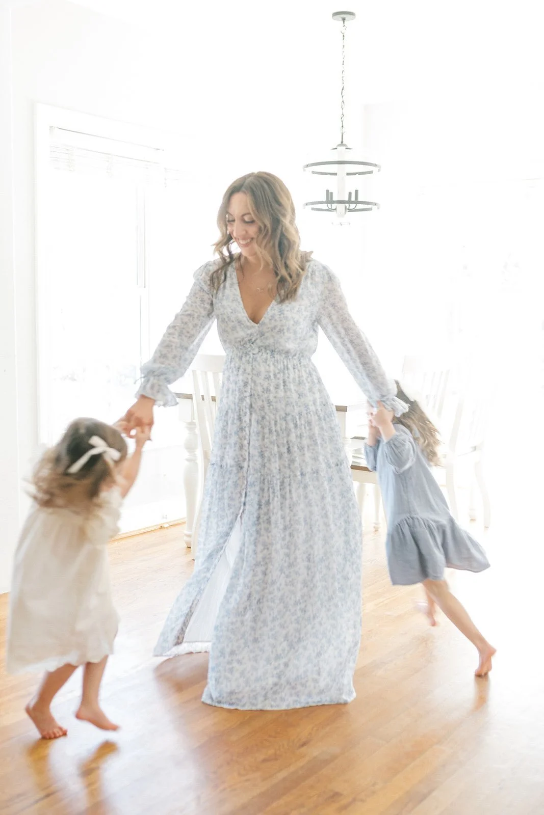 Mom and daughters dancing - Raleigh Newborn Photographer