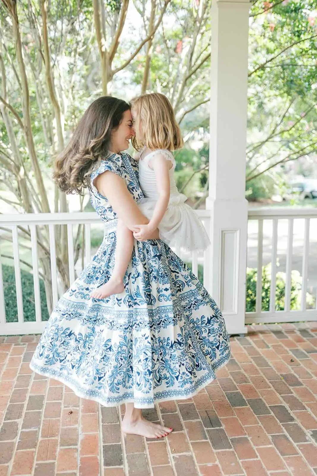 Mom dancing with daughter - Raleigh Newborn Photographer