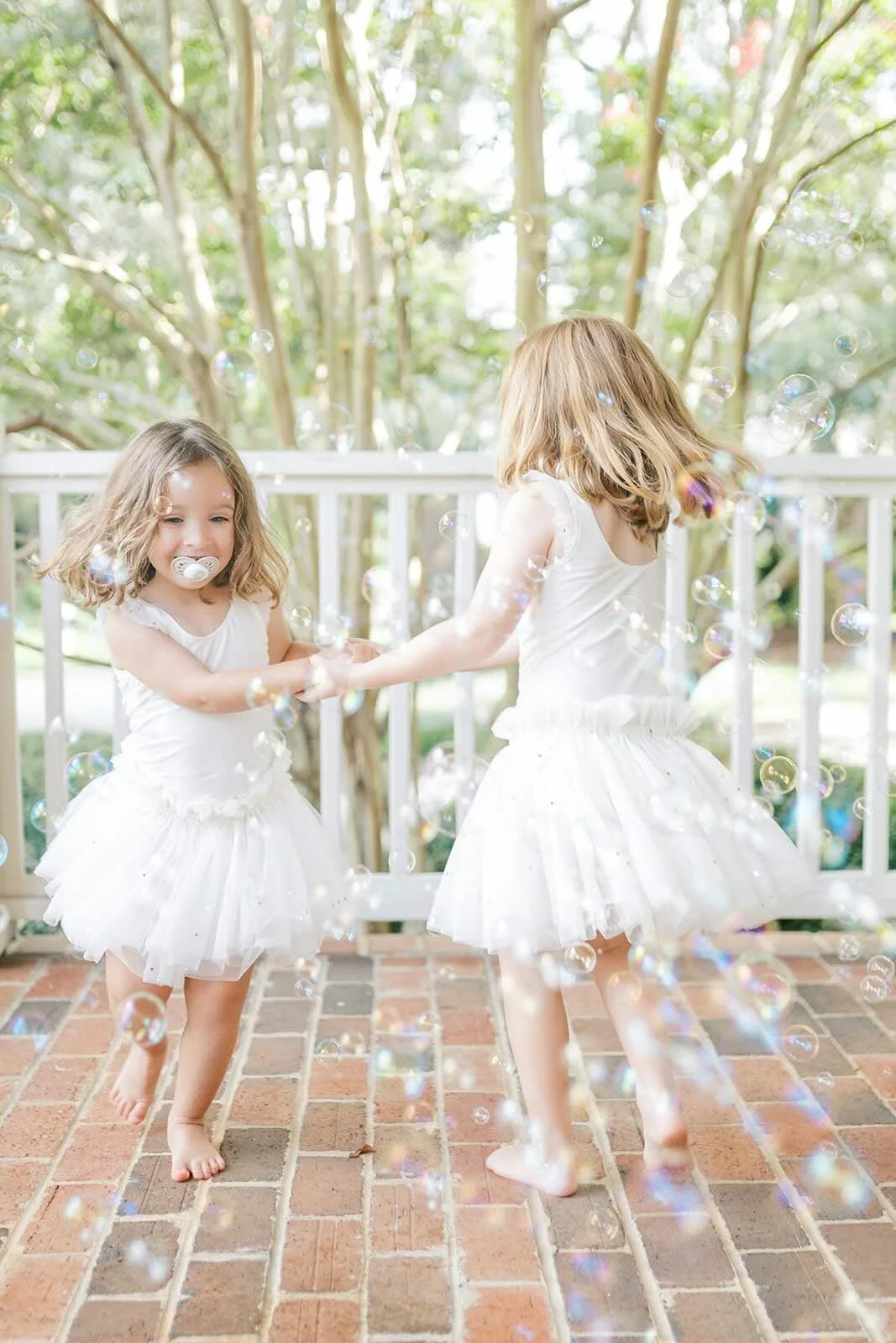 Twirling in the bubbles outside - Raleigh Newborn Photographer