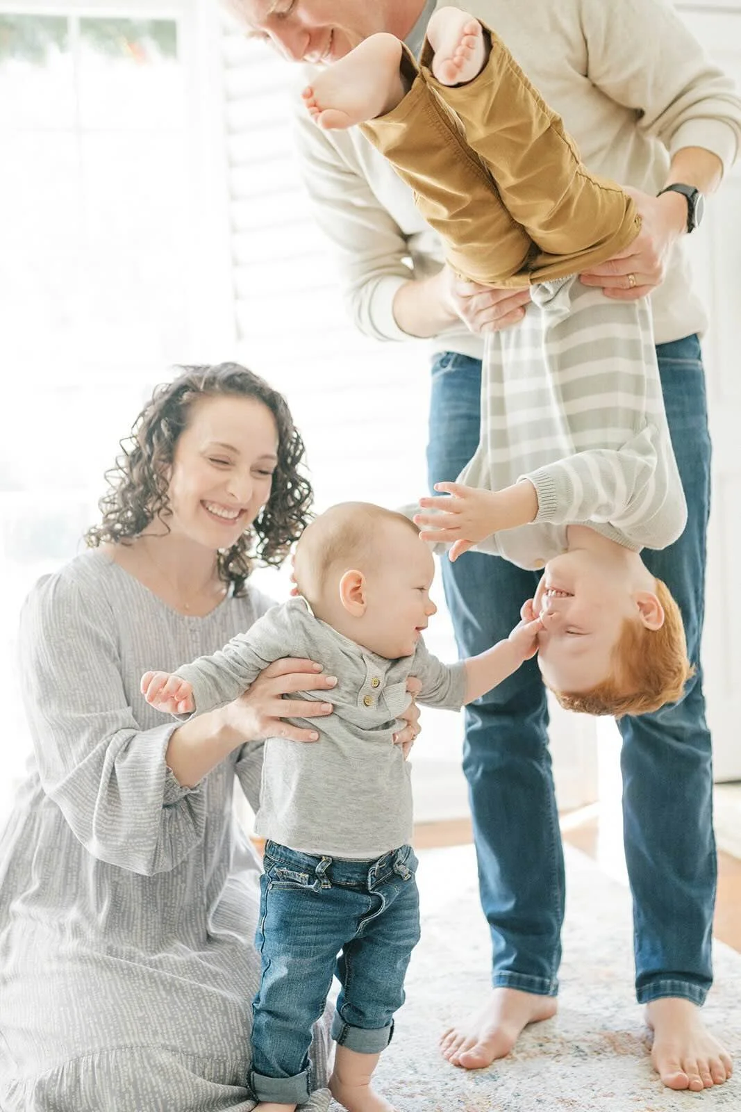 Brother silliness with Mom and Dad - Raleigh Newborn Photographer