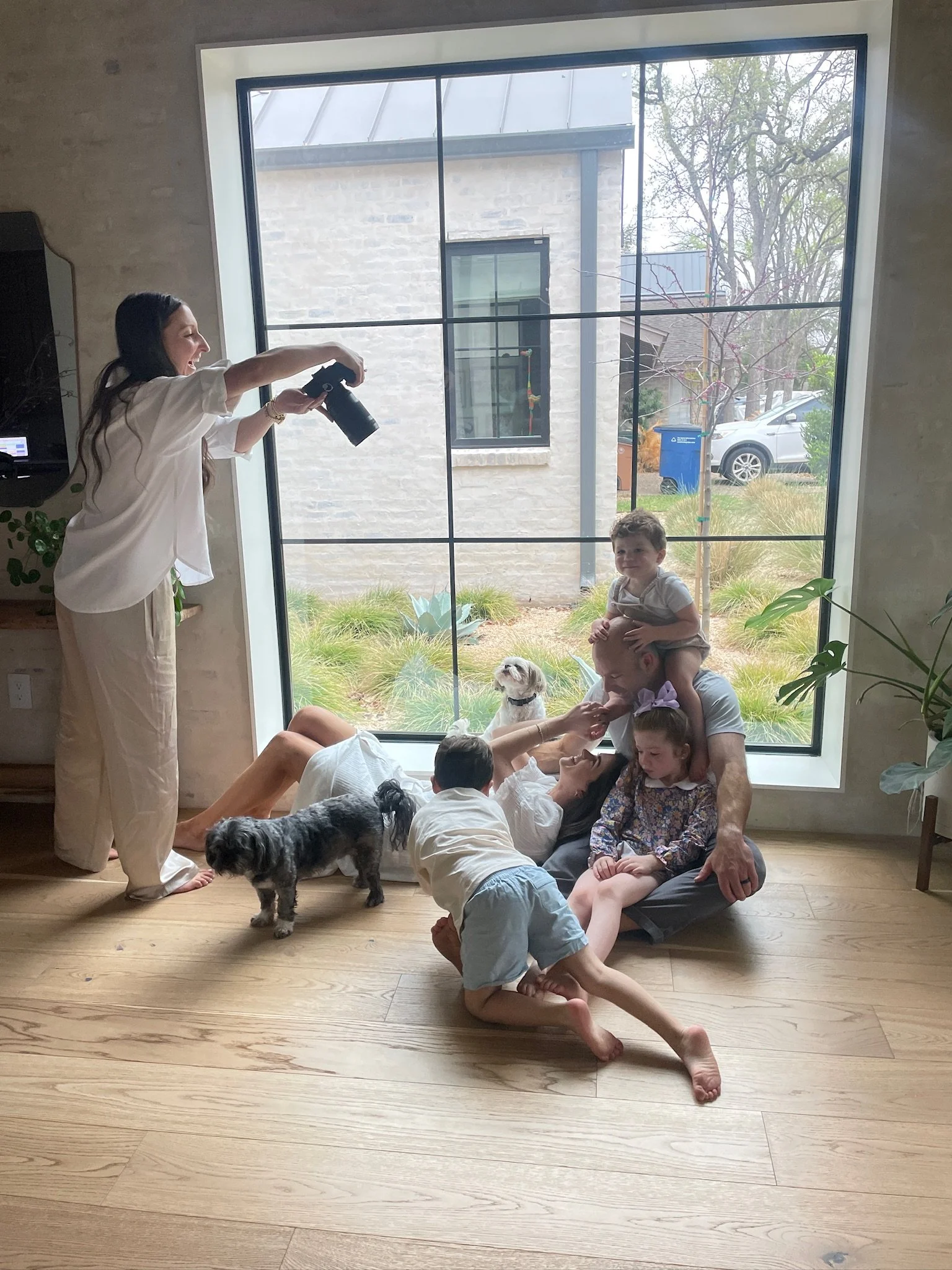 Kelly leading an in-home family session in Austin, Texas.