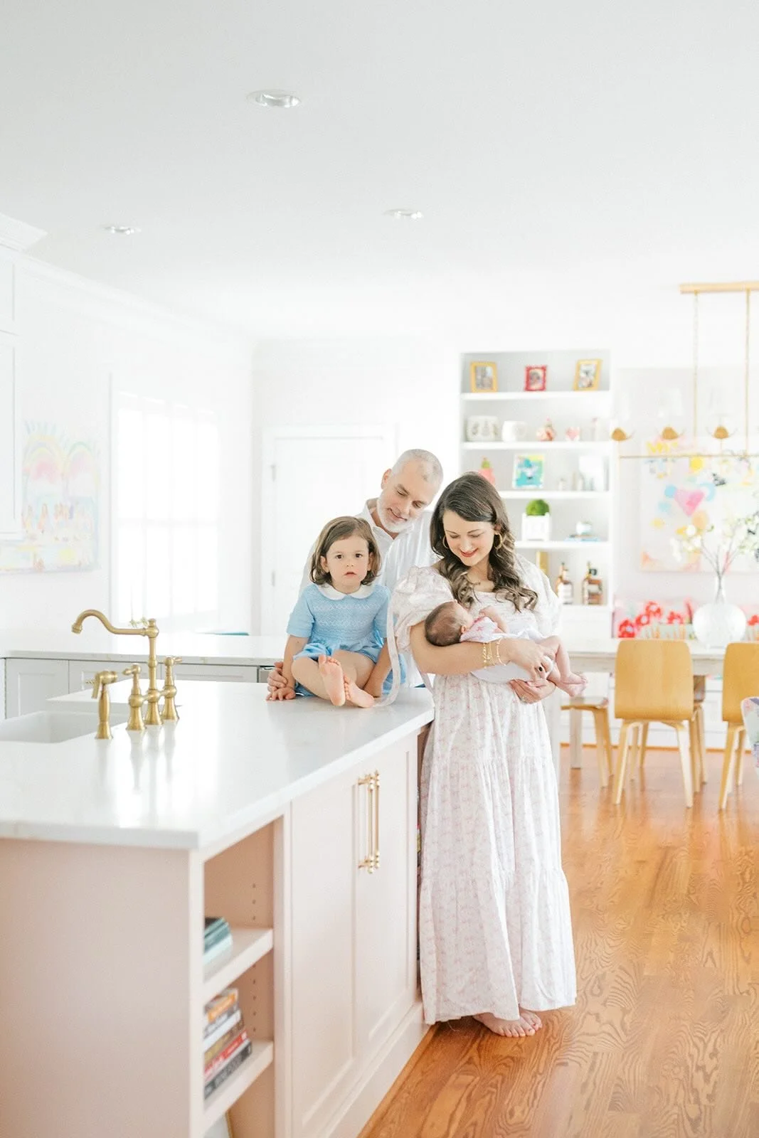 Family of four in the kitchen - Raleigh Newborn Photographer