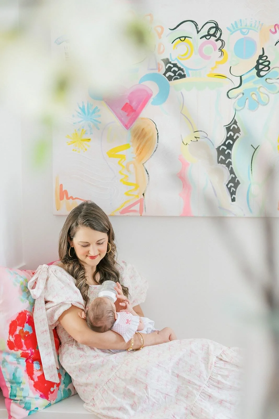 Mother giving baby a bottle - Raleigh Newborn Photographer