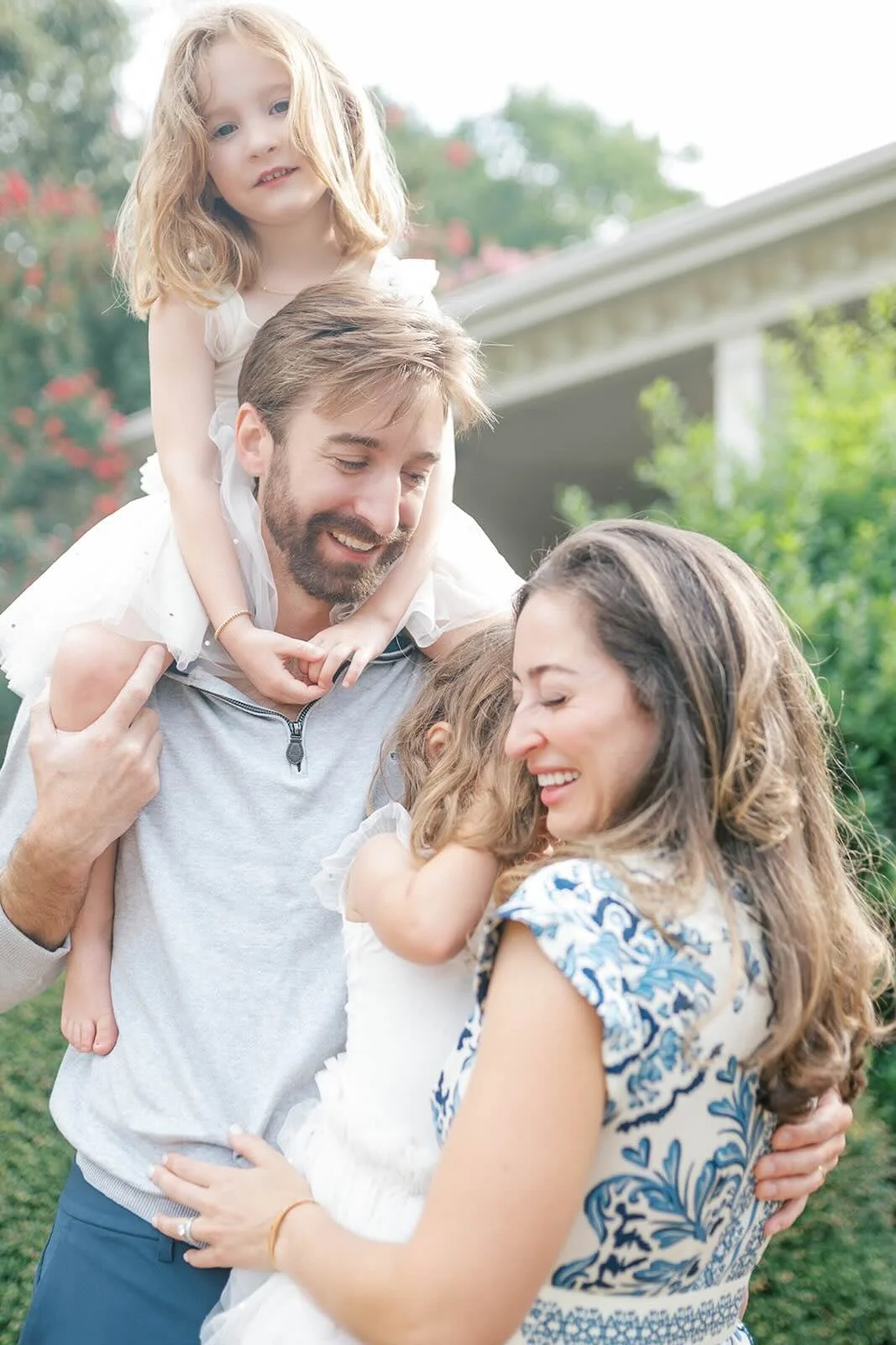 Family hugs outside - Raleigh Newborn Photographer