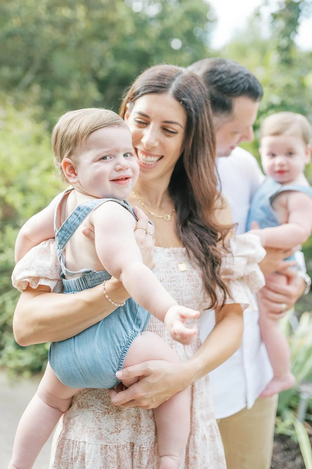 Mother and Father with their twins outside - Raleigh Newborn Photographer