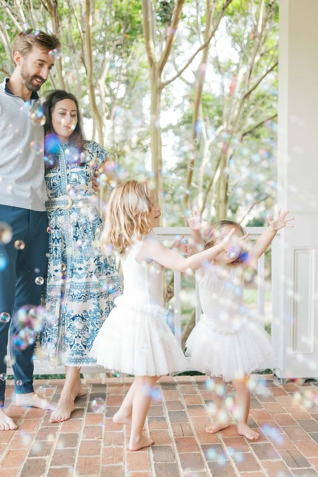 Family fun with bubbles outside - Raleigh Newborn Photographer