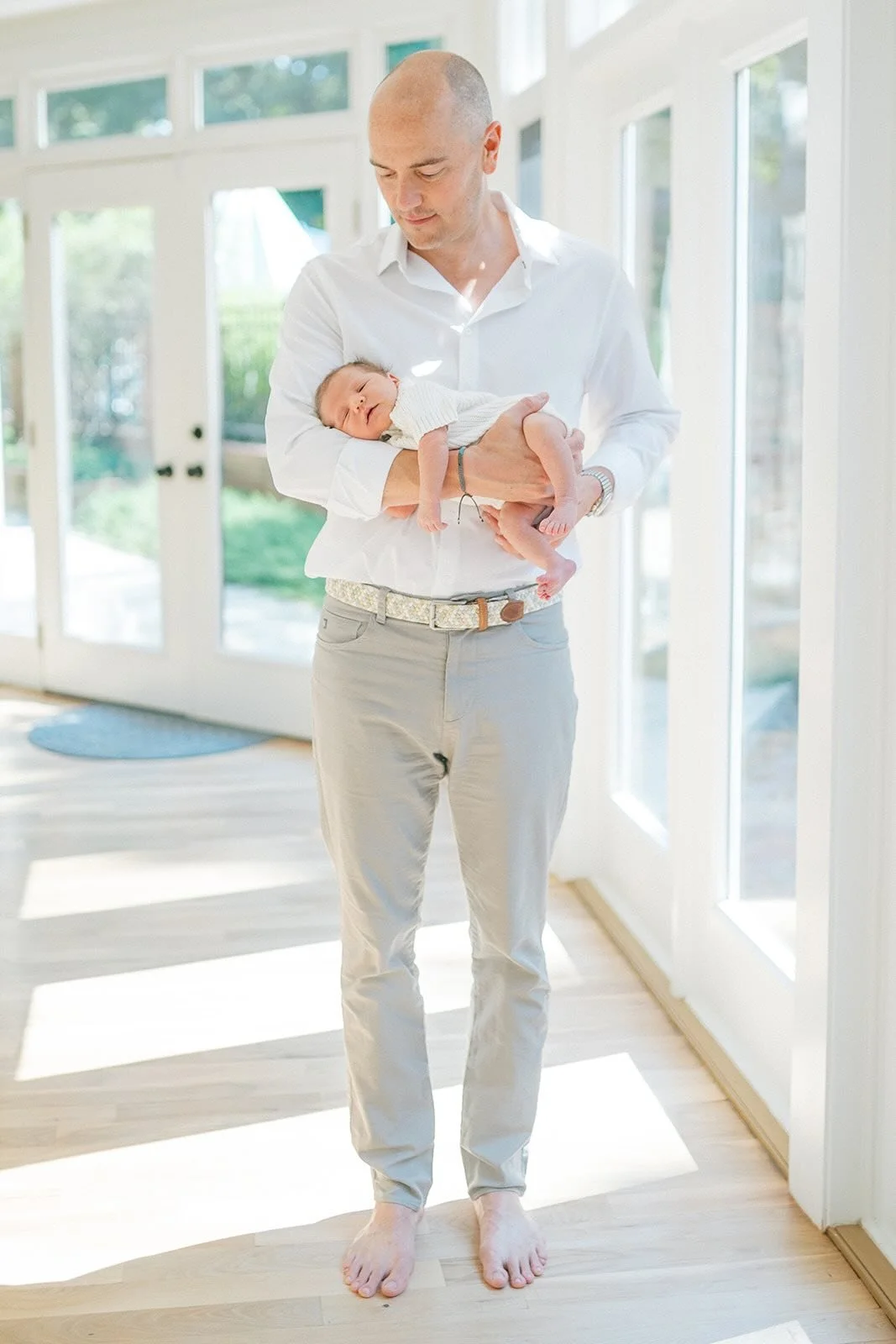 Dad holding baby boy - Raleigh Newborn Photographer