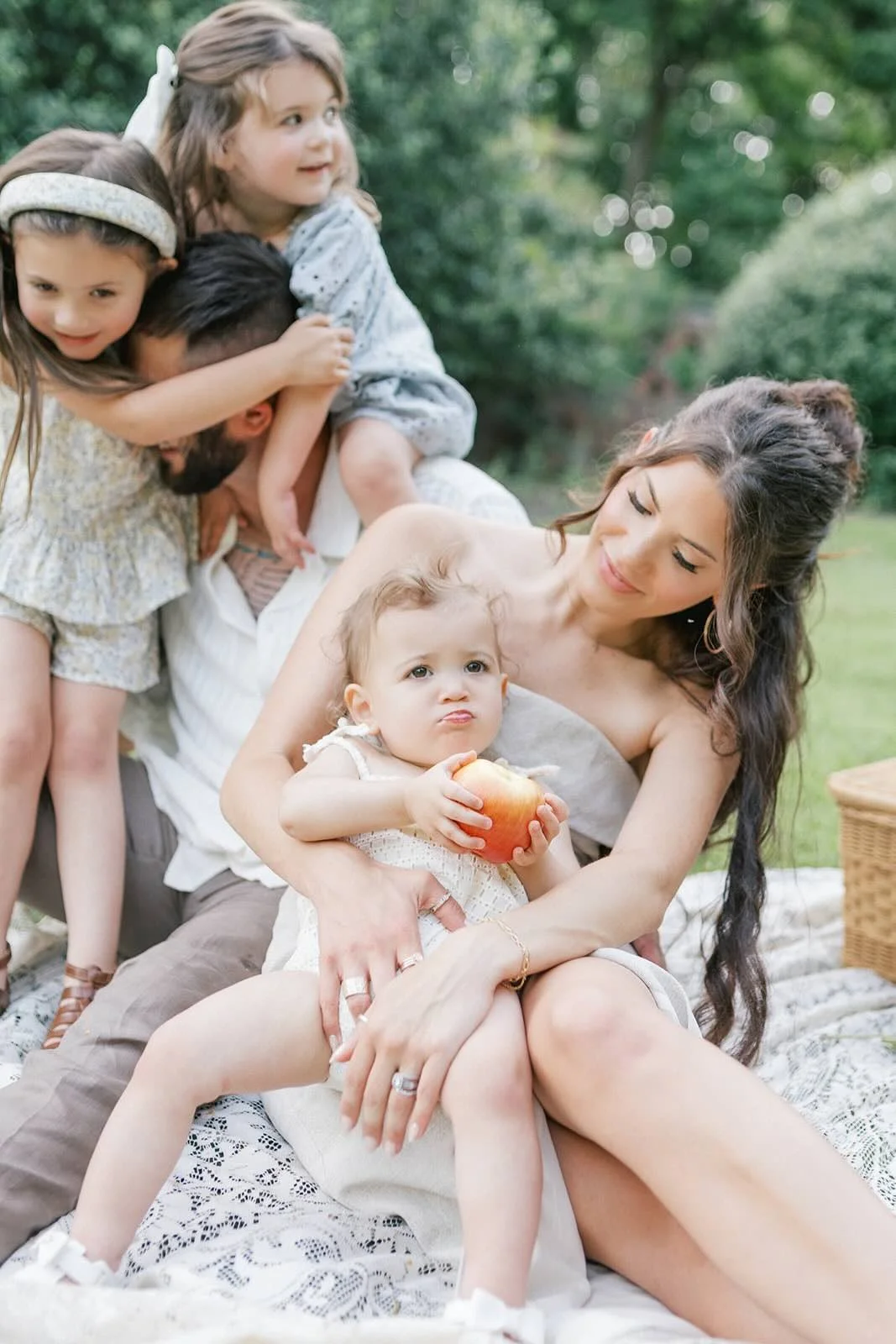 Family outside having a picnic - Raleigh Newborn Photographer