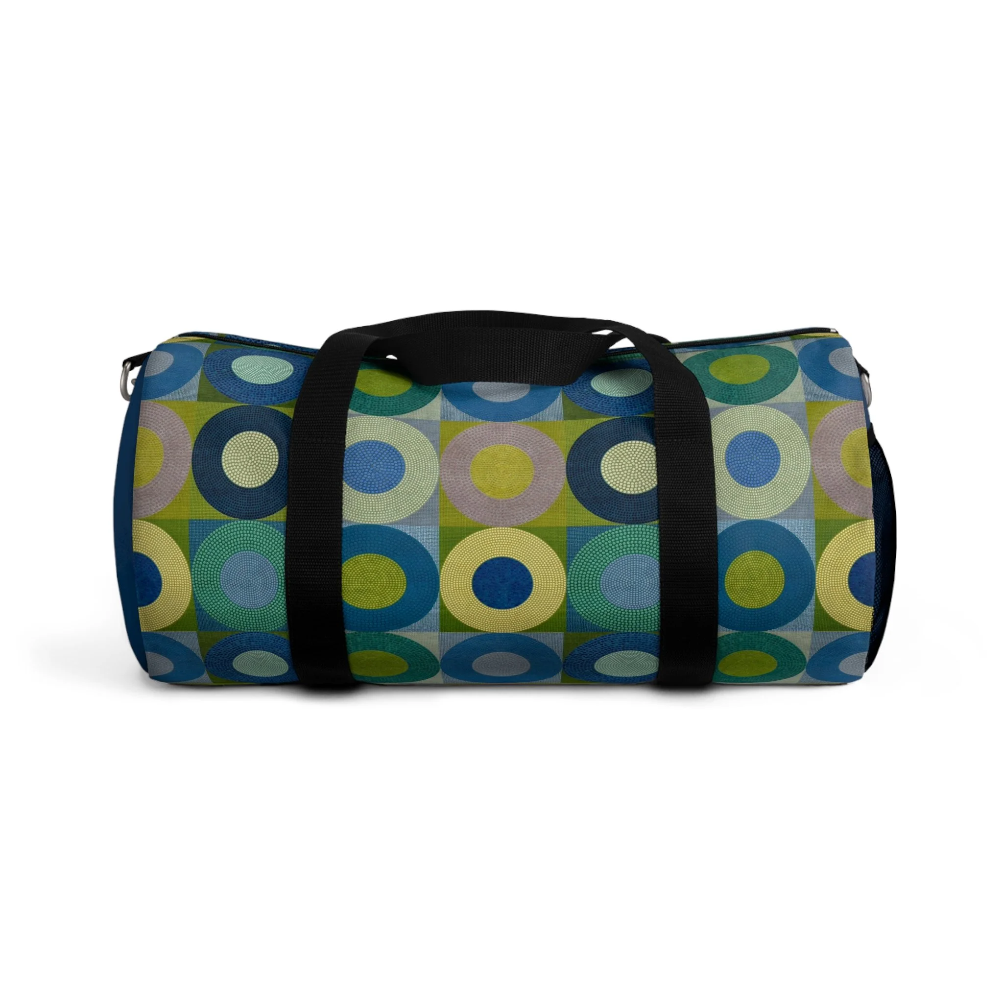 Geometric art duffel bag featuring a colorful abstract design adapted from an original encaustic painting by Ross Ozer of rjostudio.