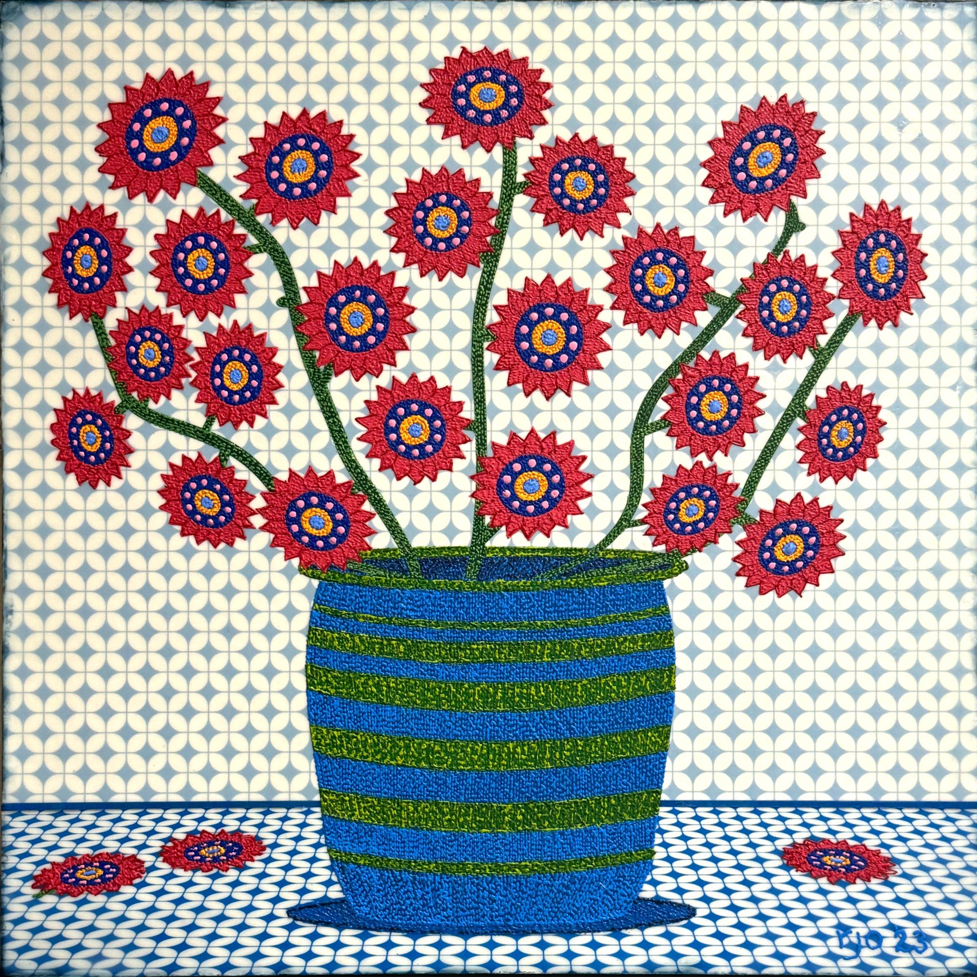 Red Flowers in a Blue and Green Pot