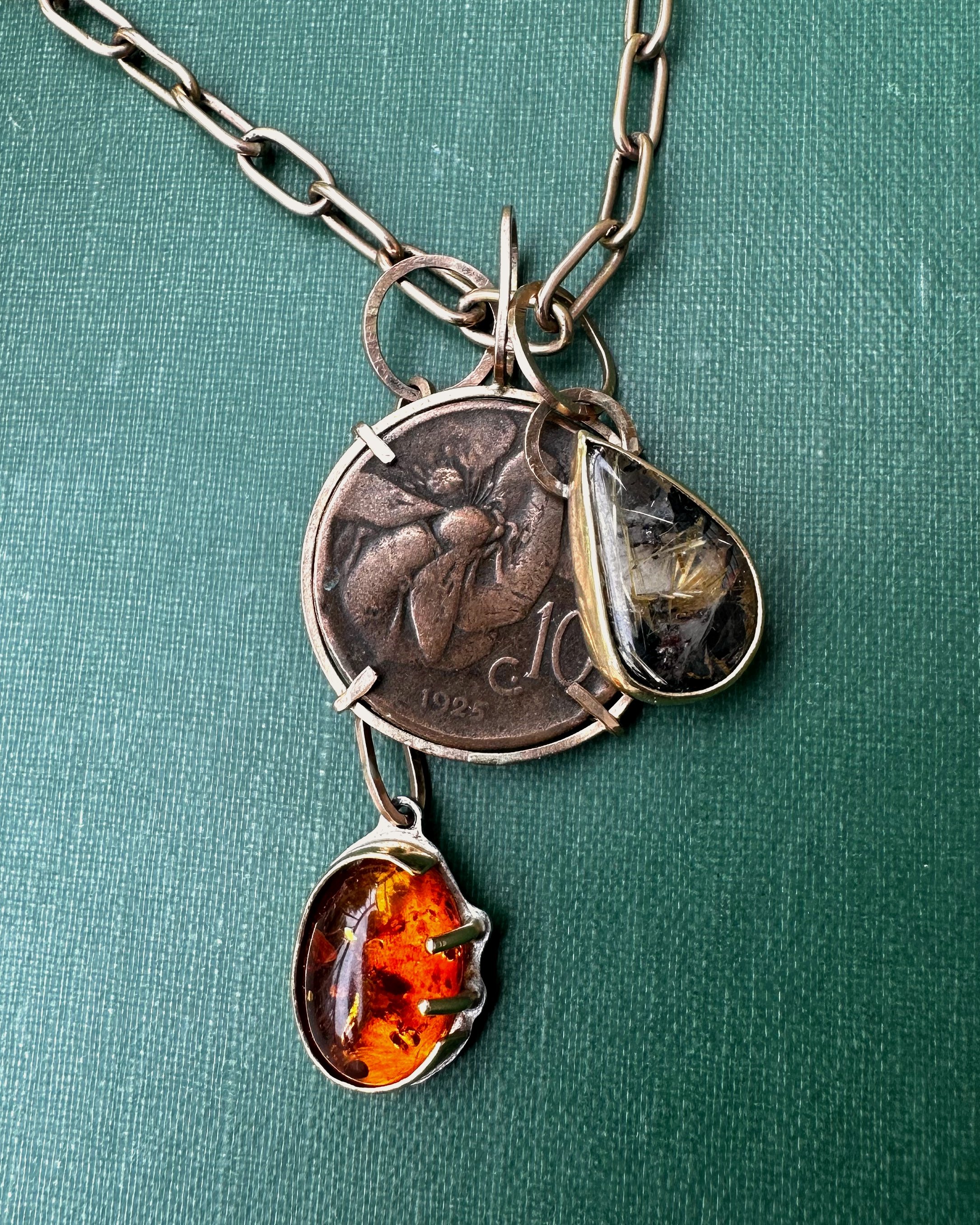 Sterling silver, 14k gold fill, 18k gold, amber, quartz, antique coin.
