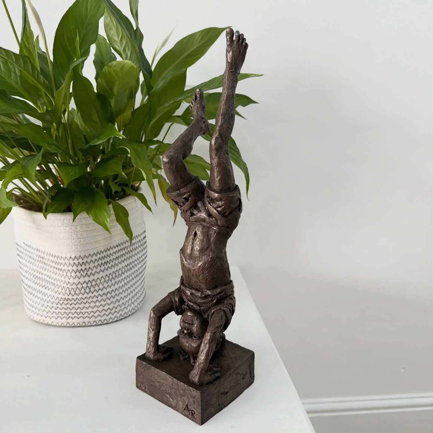 Anna Rothwell is a figurative sculptor whose work explores the expressive power of the human form. Trained in Figurative Sculpture and Ceramics, her sculptures range from detailed realism to more abstract pieces that capture movement, emotion, and th