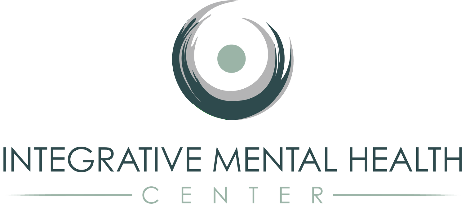 Logo of Integrative Mental Health Center featuring a stylized circular design with swirls and a central dot, with the center's name below.