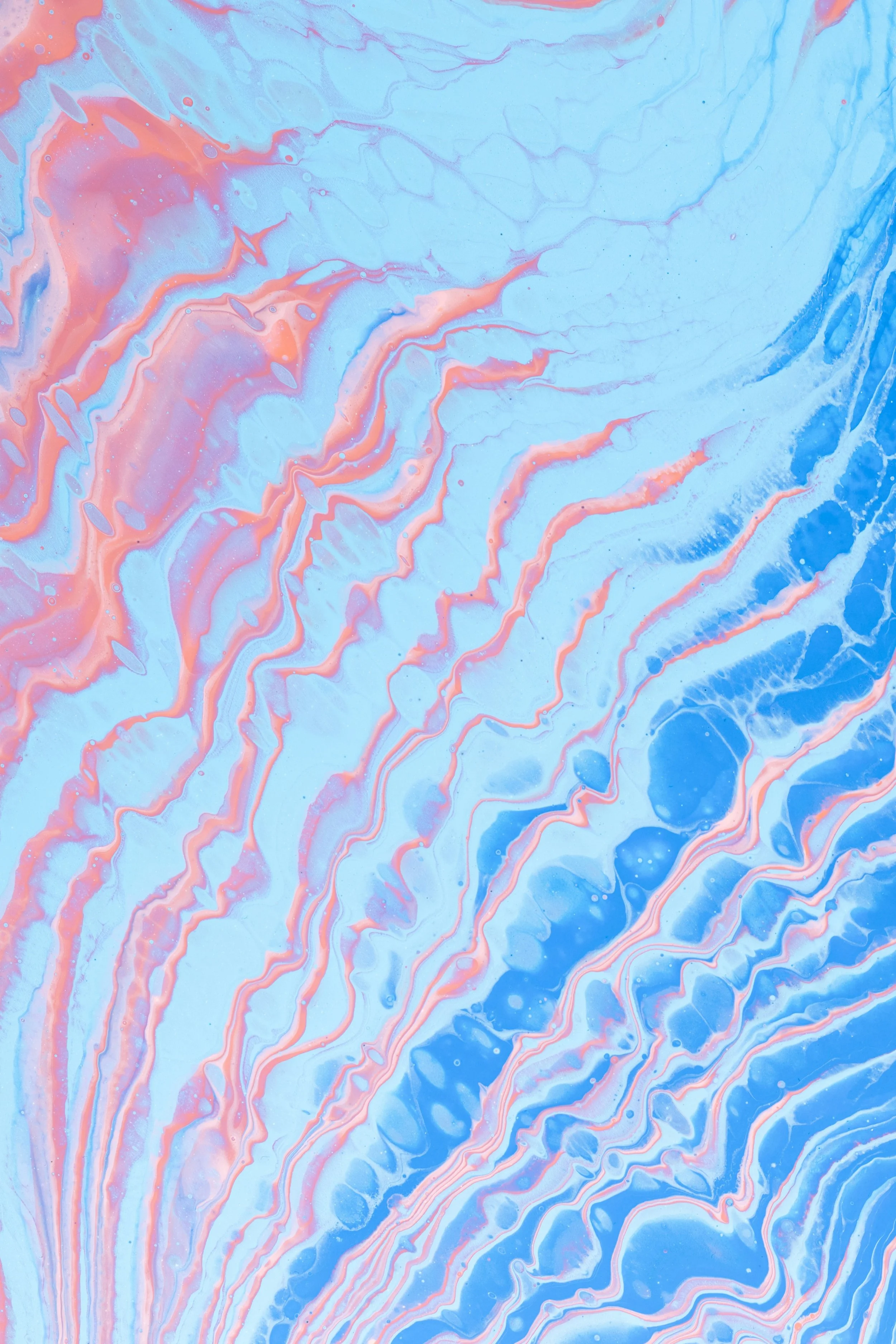 Blue and pink marbled pattern symbolizing brain connectivity and mental health transformation