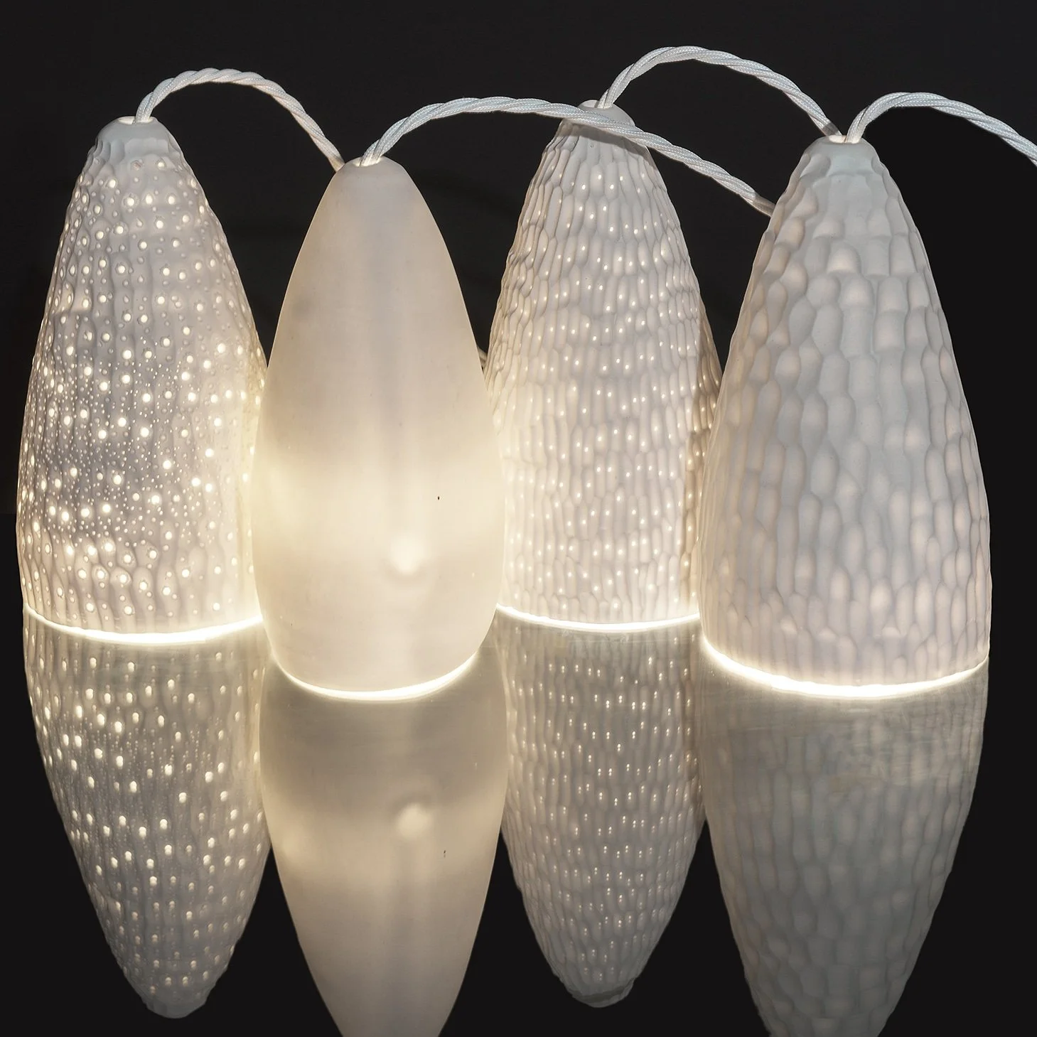 Victoriaj_porcelainpendant_2024_BrentonMcGeachie.jpg