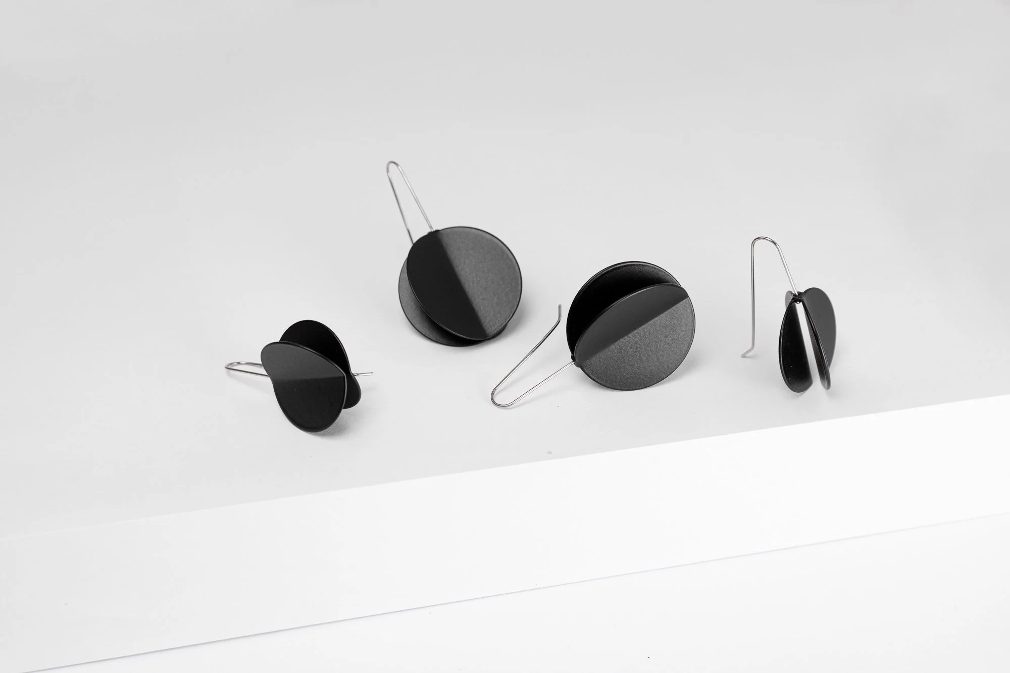 FerroForma_Jewellery_WingEarrings_Large_Black_Group_02_Photo-AlisonJackson.jpg