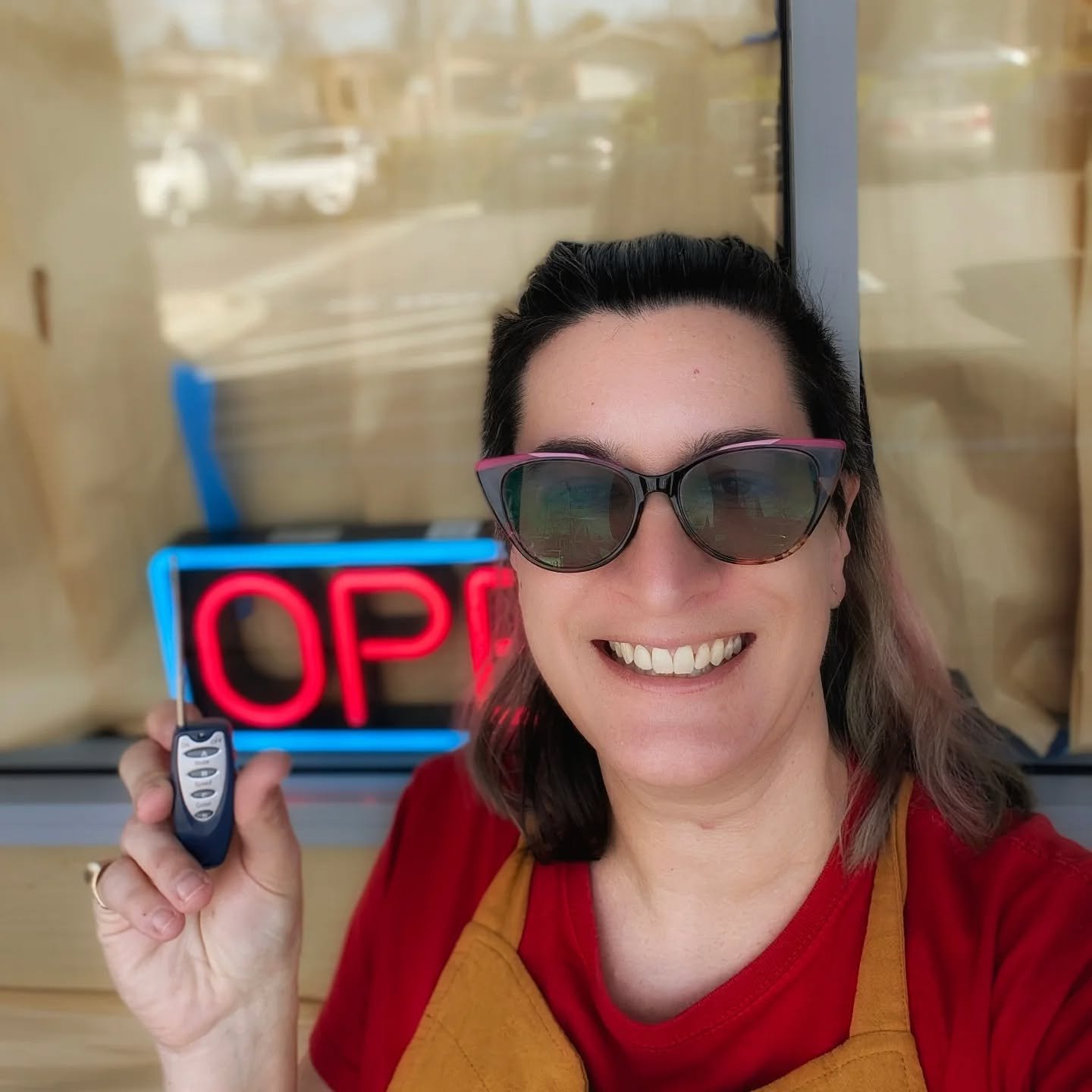 Living my best henchwoman life with the remote for the opening sign! 
We're popping up at the storefront from 12pm till 5/6pm!
We still have a few 'Orange You Glad' sweet rolls! 🍊
It's got an antenna! 🤣
▪️
#popup #smallbusiness #remote #henchwoman 