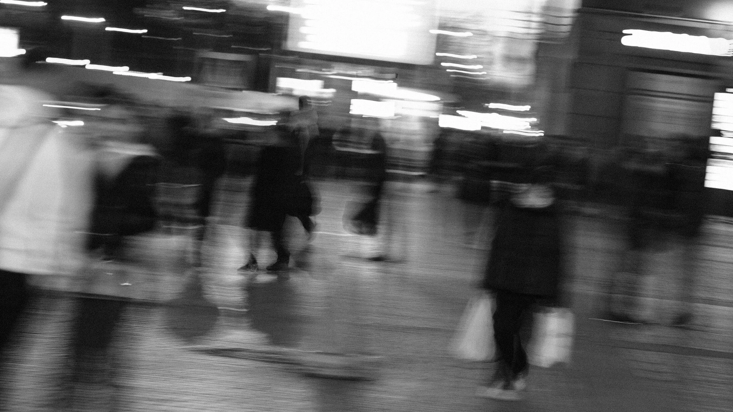 Blurry image of people on the street
