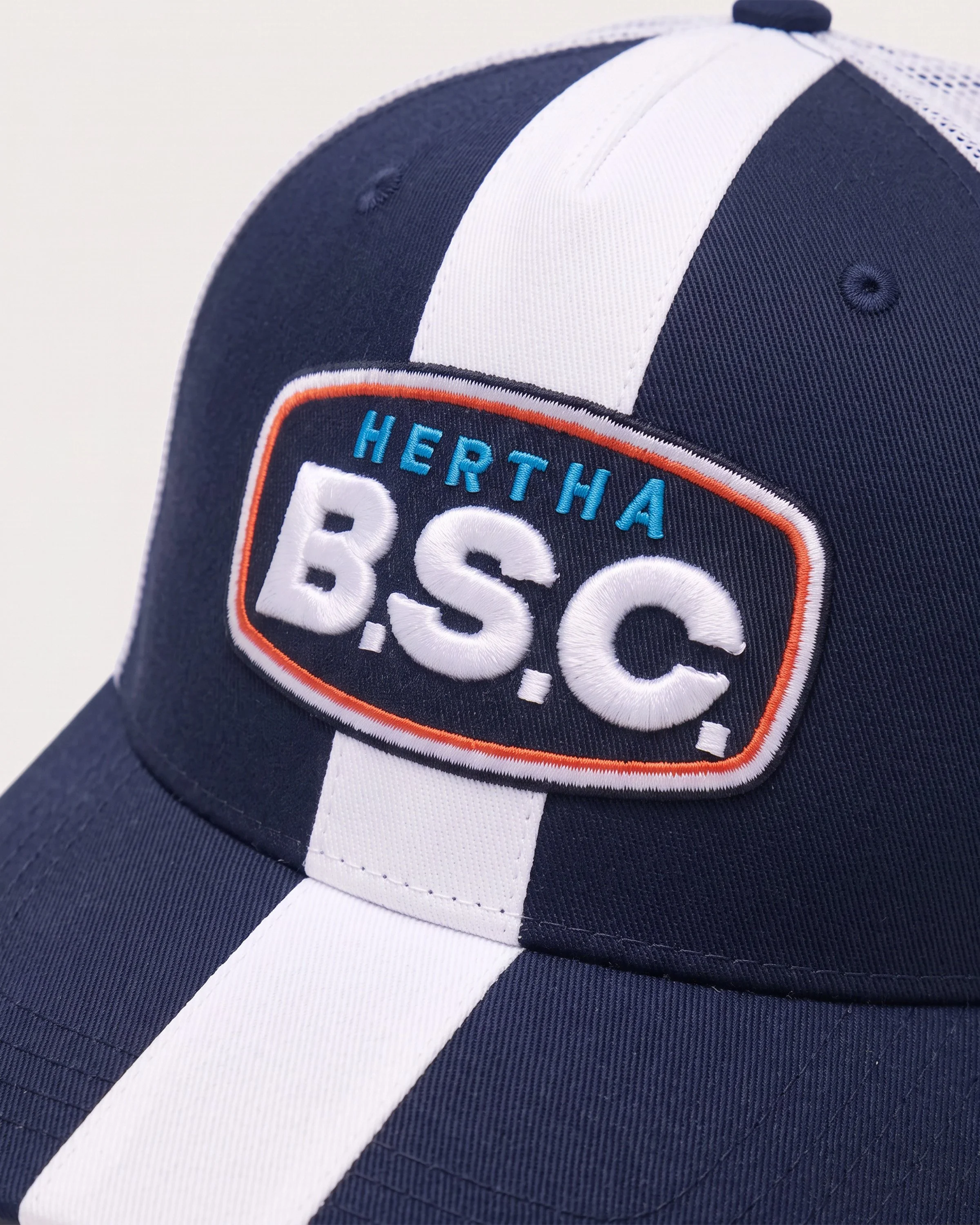 101_racing-collection_trucker-cap_detail.jpg