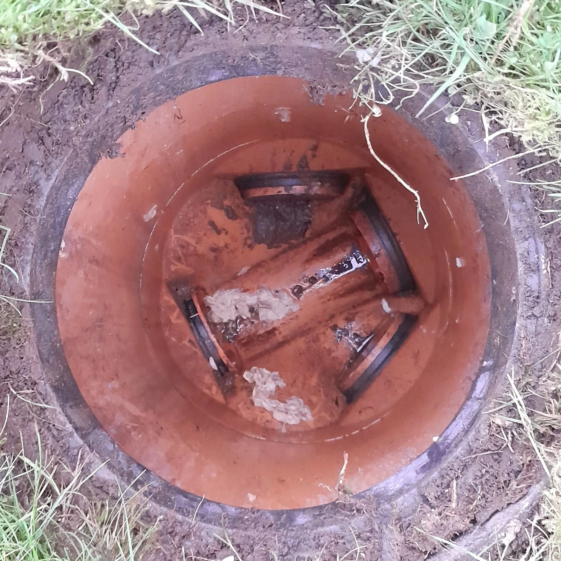 A Drain clearance has been achieved by jetting from the manhole located on the front lawn.