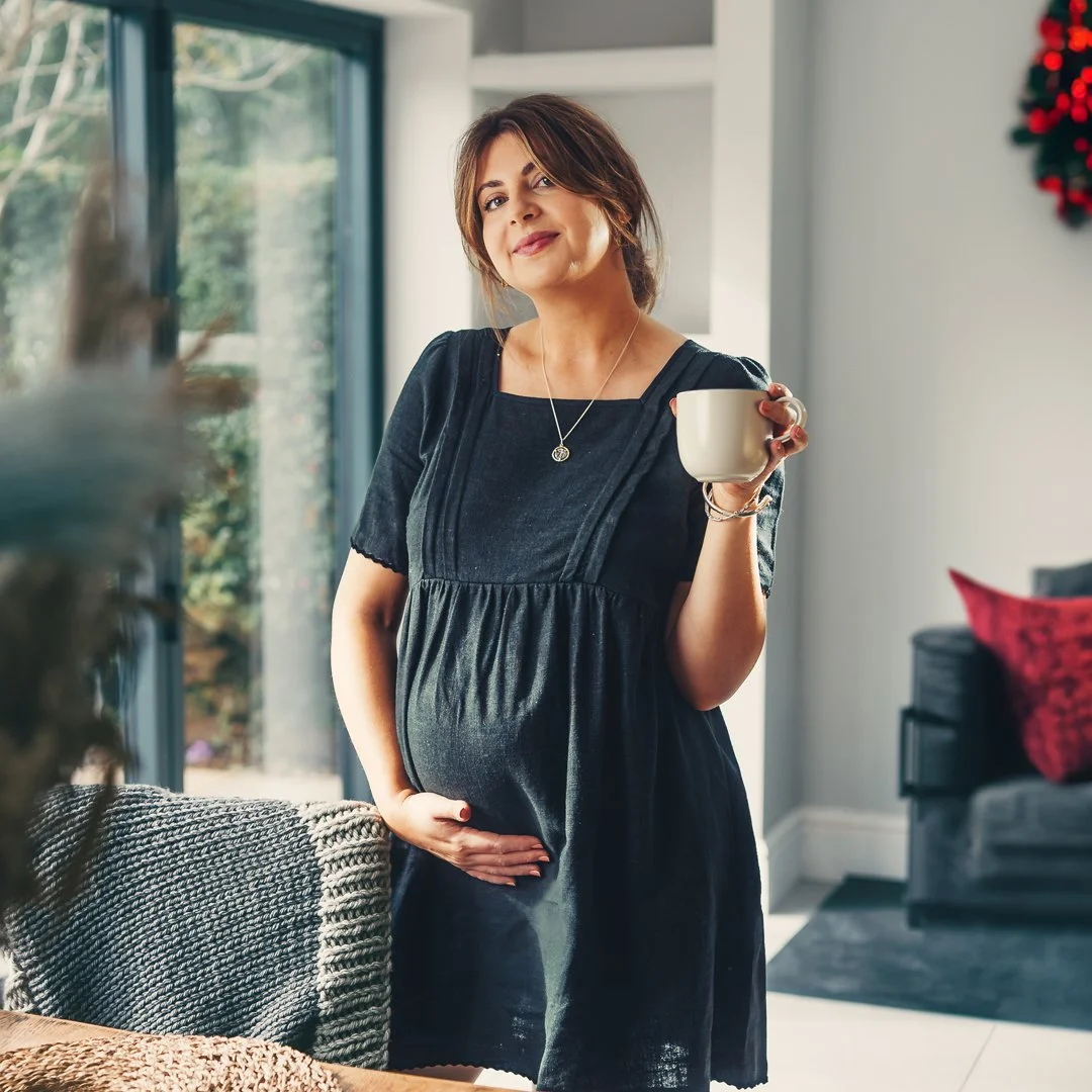The Poppy mini dress in black linen and viscose mix.
