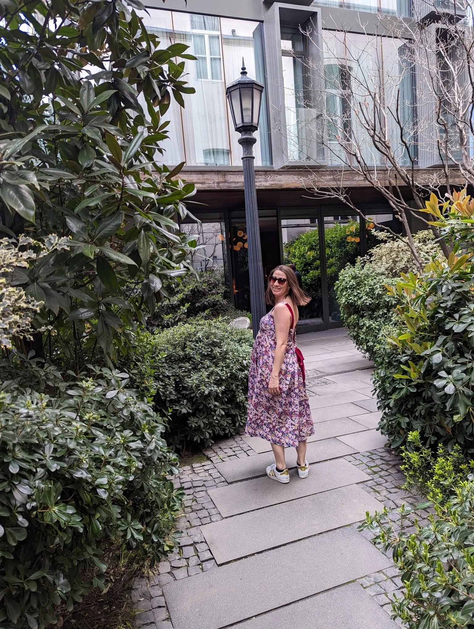 Nomadic mother maternity and breast feeding friendly dress worn by a customer