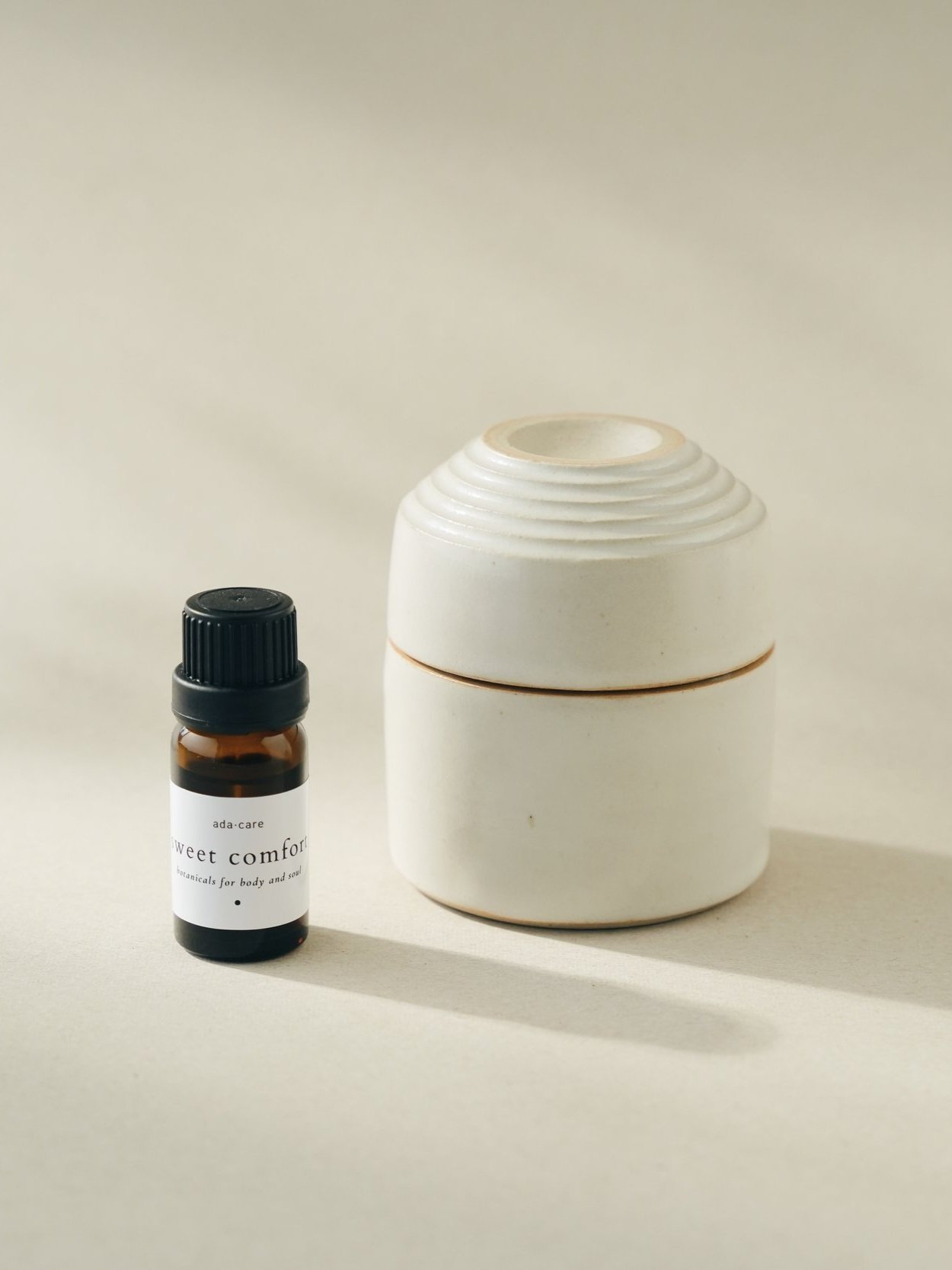 aromadoos box van studio maeck met flesje etherische olie synergie sweet comfort van adacare