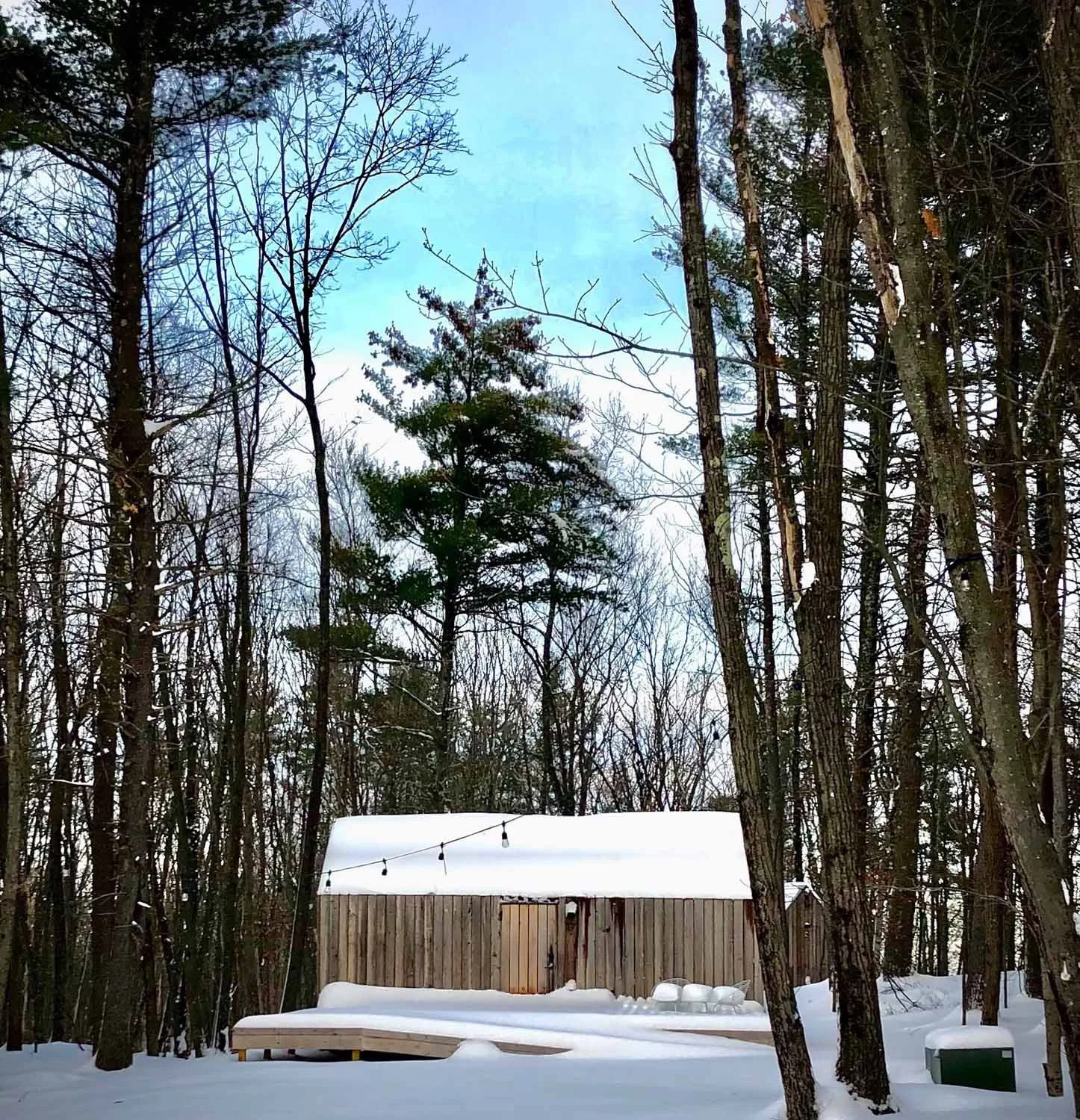 Cabin with a blanket of snow and clear winter sky.jpg