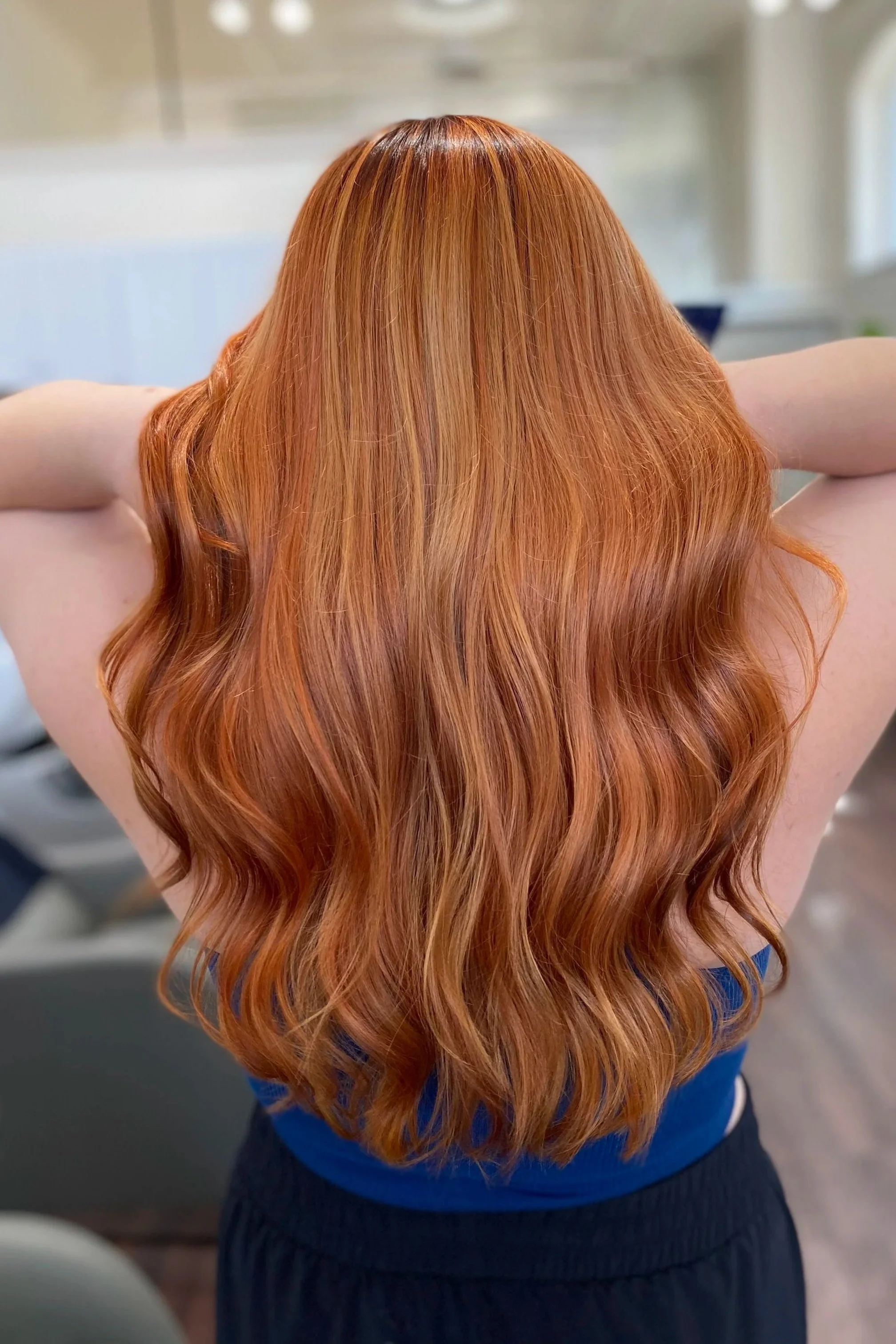 back of the head of red haired girl