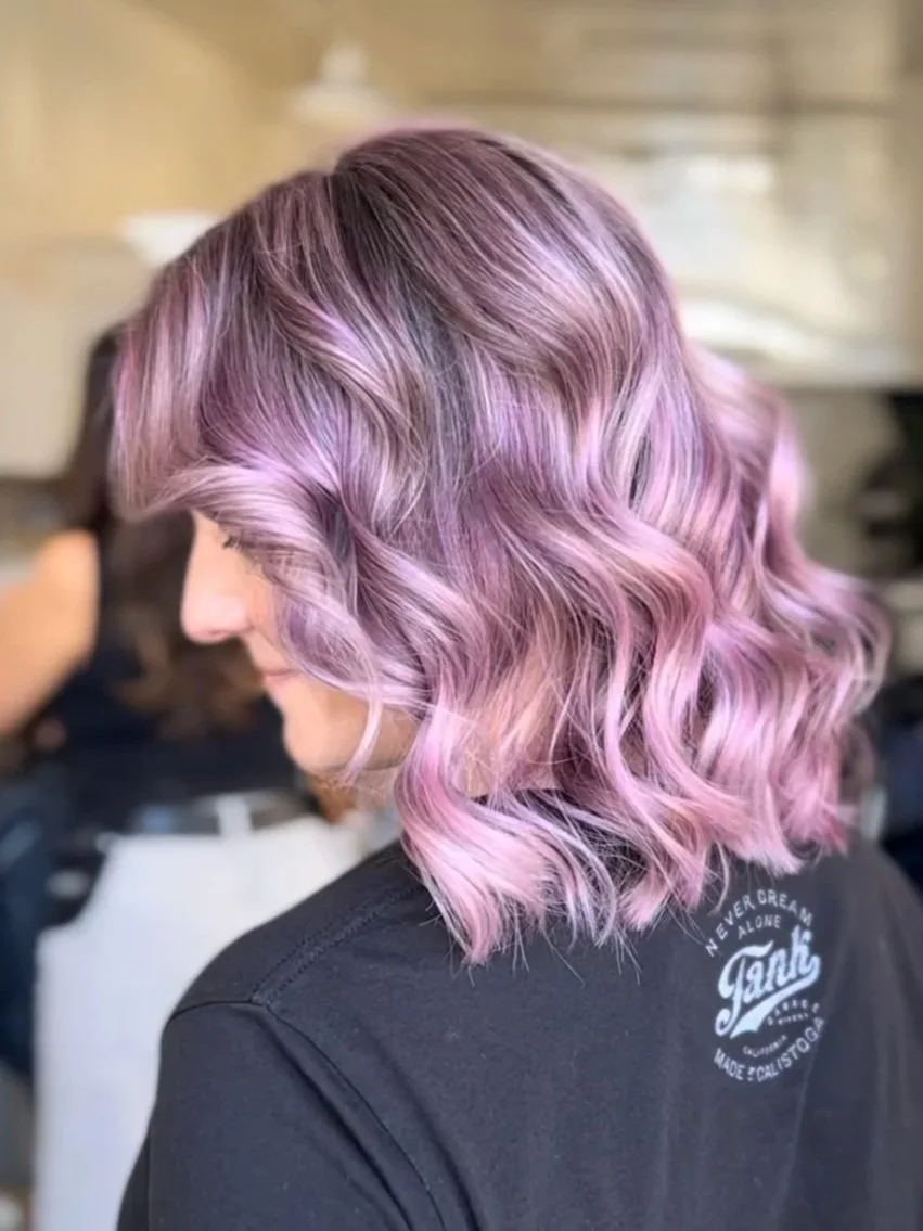 side profile of woman with highlighted lavender hair