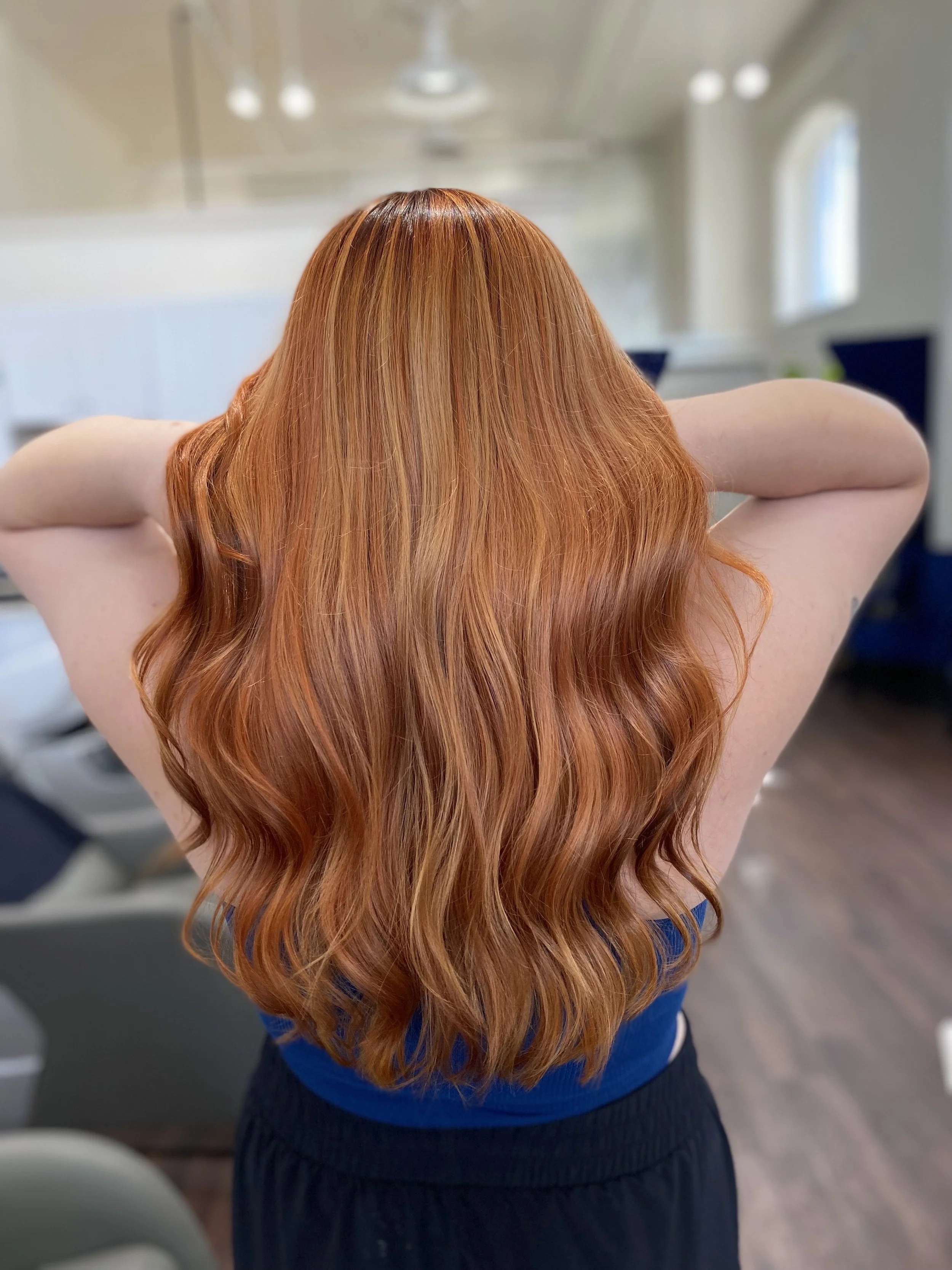 back of the head of red haired girl