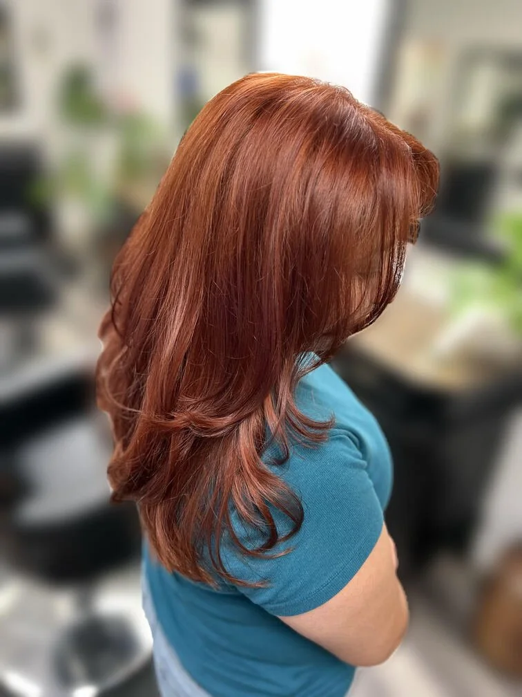 woman with aurburn long hair