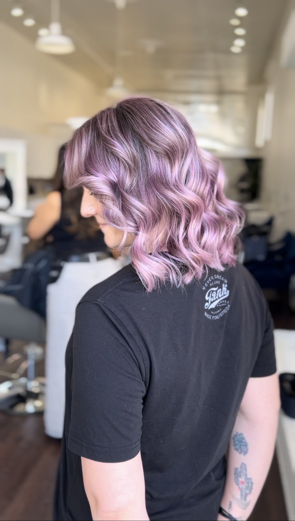 side profile of woman with highlighted lavender hair