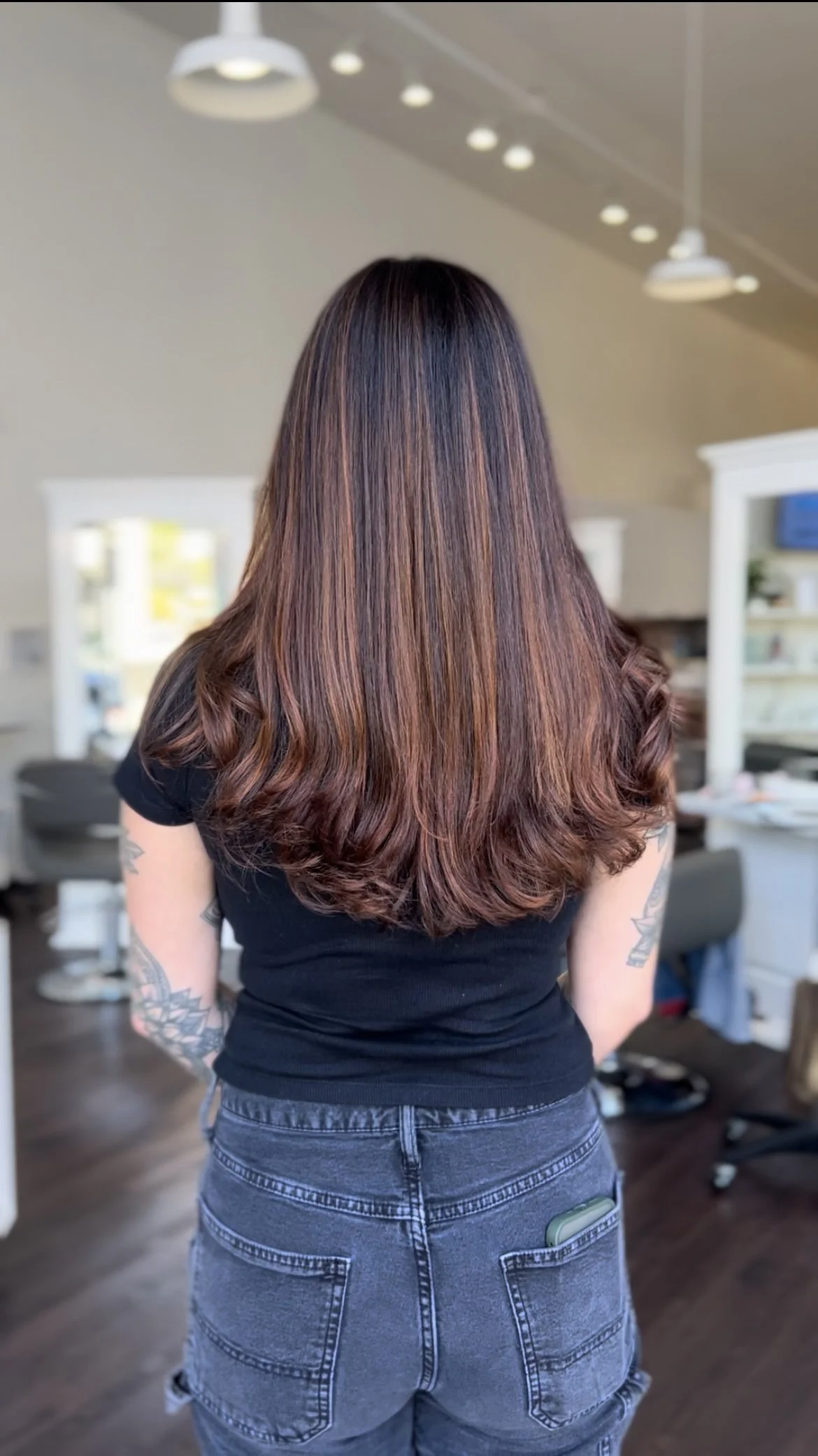 back of woman's red highlighted hair