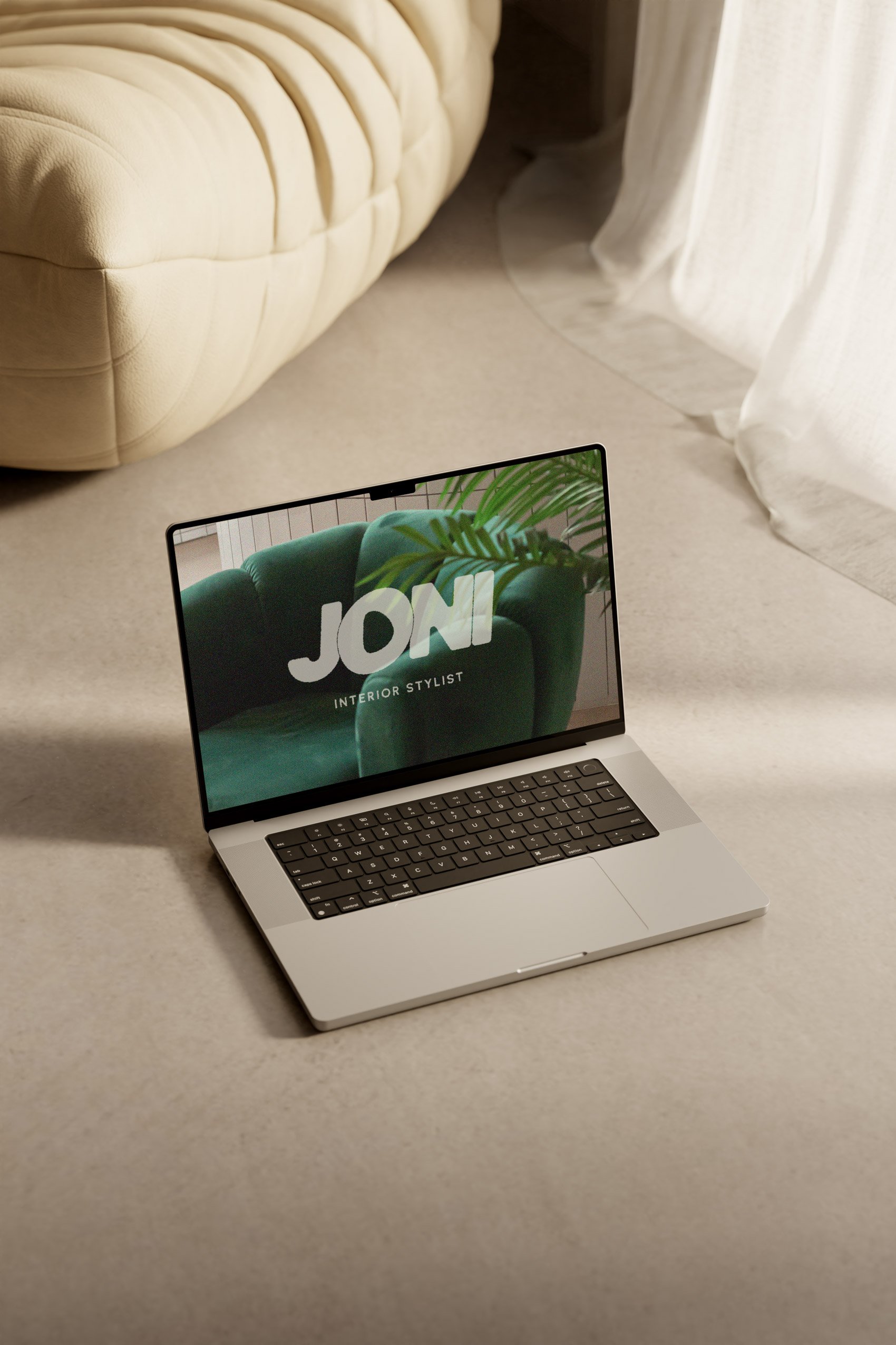 joni-interior-stylist-logo-brand-identity-on-laptop-mock-up-lugi-design-studio.jpg