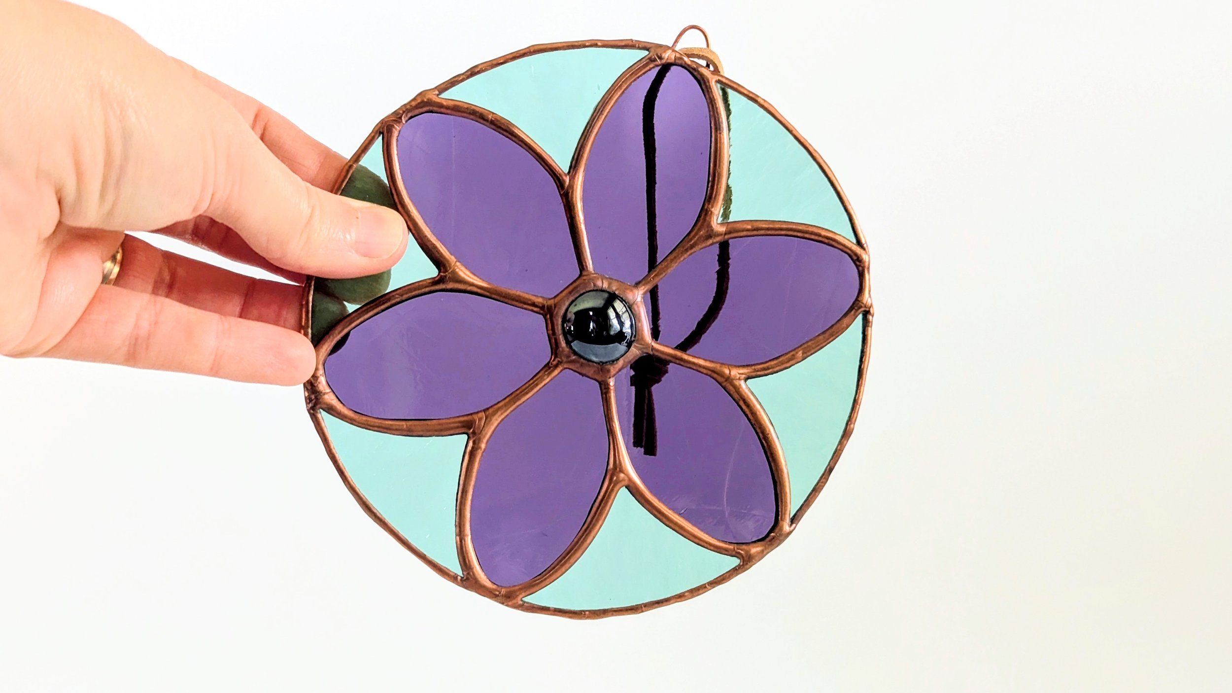 circle flower hand horizontal.jpg