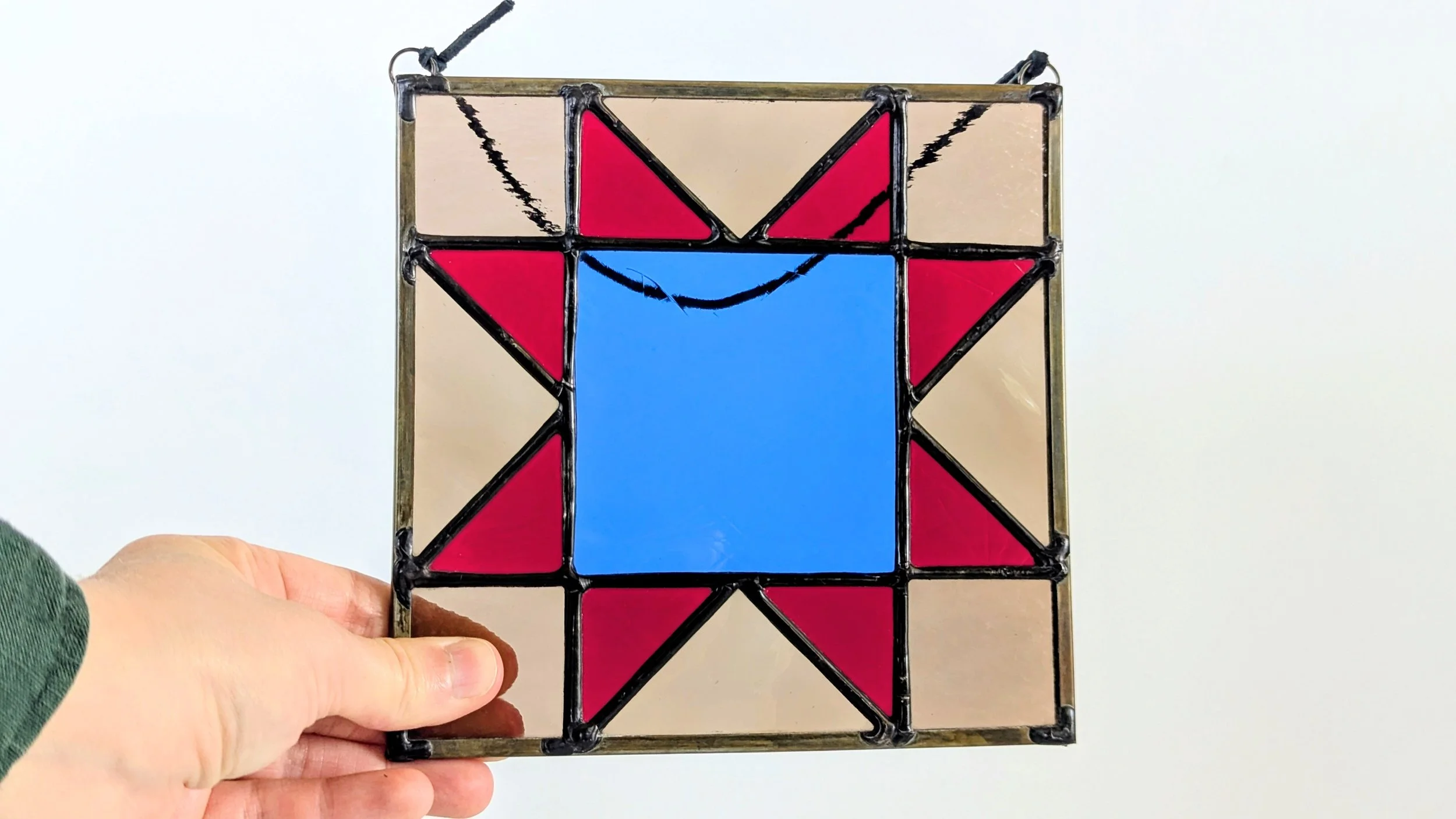 blue red quilt hand horizontal.jpg