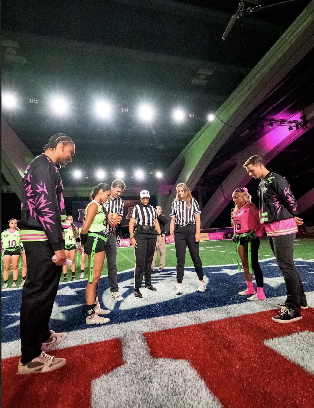 Gigi Torres standing next to her coach NFL superstar Brock Purdy awaiting the coin toss 49ers training facility in Santa Clara. (Photo contributed)